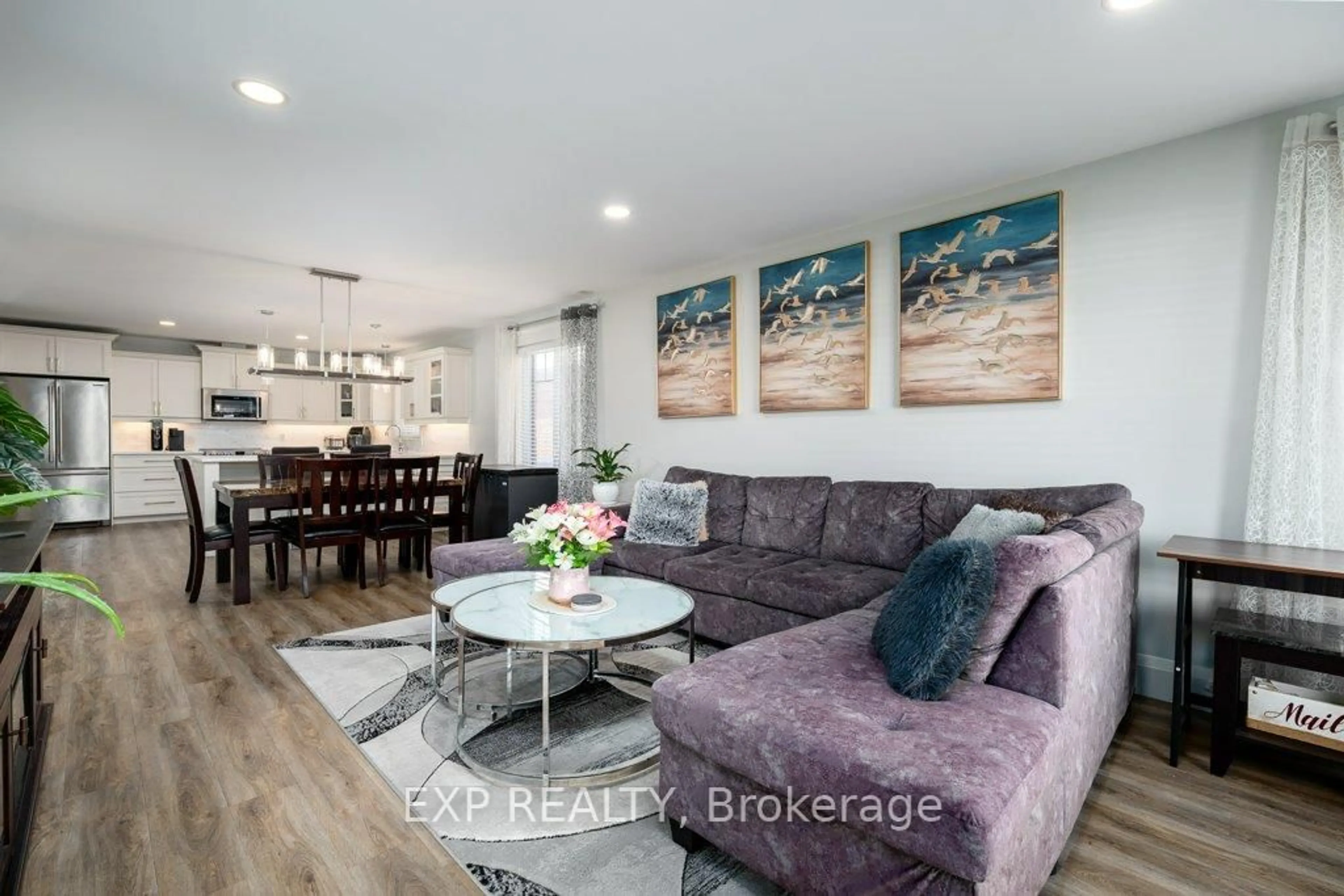 Living room with furniture, wood/laminate floor for 9 Cardinal Crt, Brighton Ontario K0K 1H0