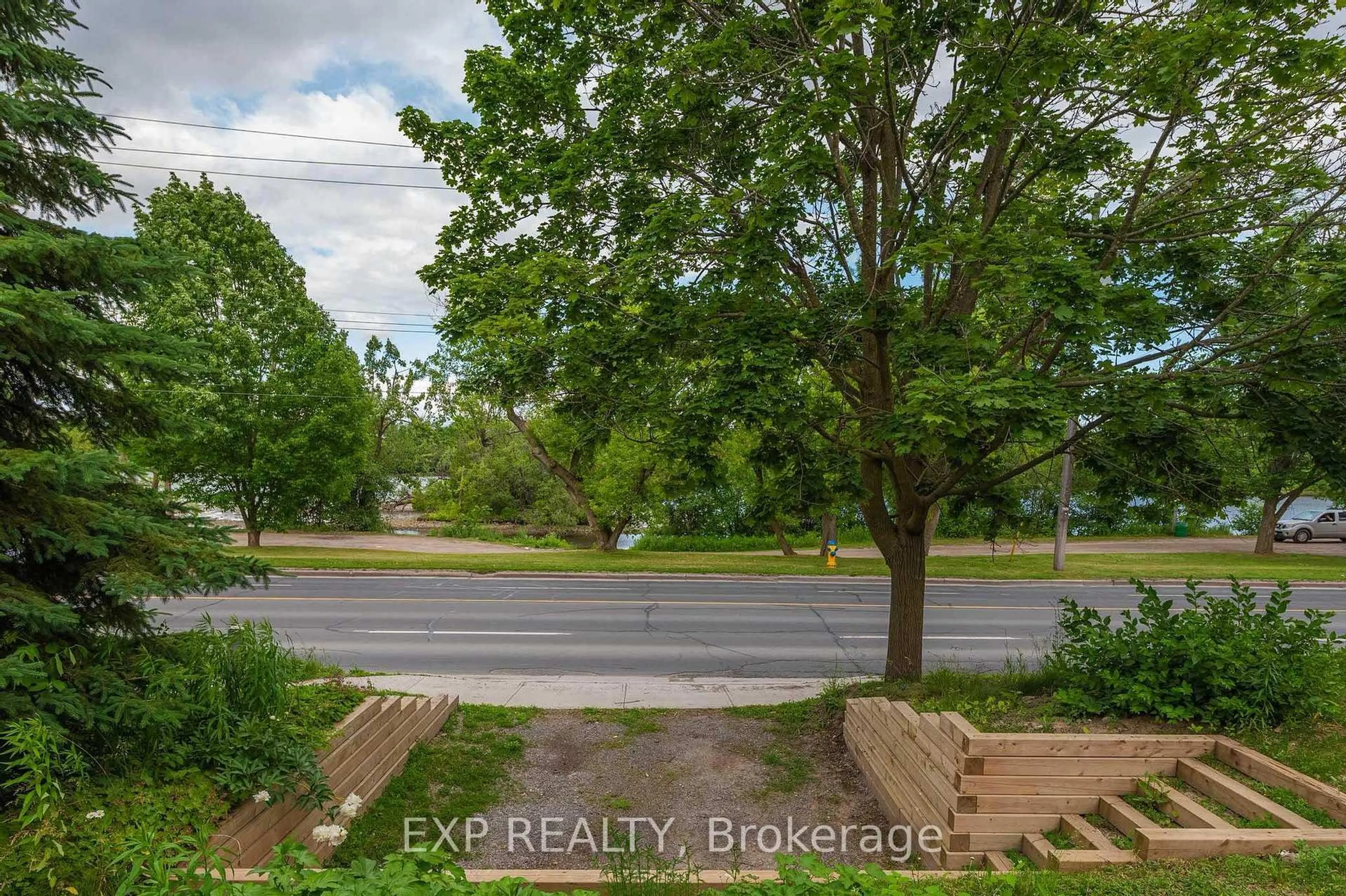 A pic from outside/outdoor area/front of a property/back of a property/a pic from drone, water/lake/river/ocean view for 1033 Water St, Peterborough Ontario K9H 3P5