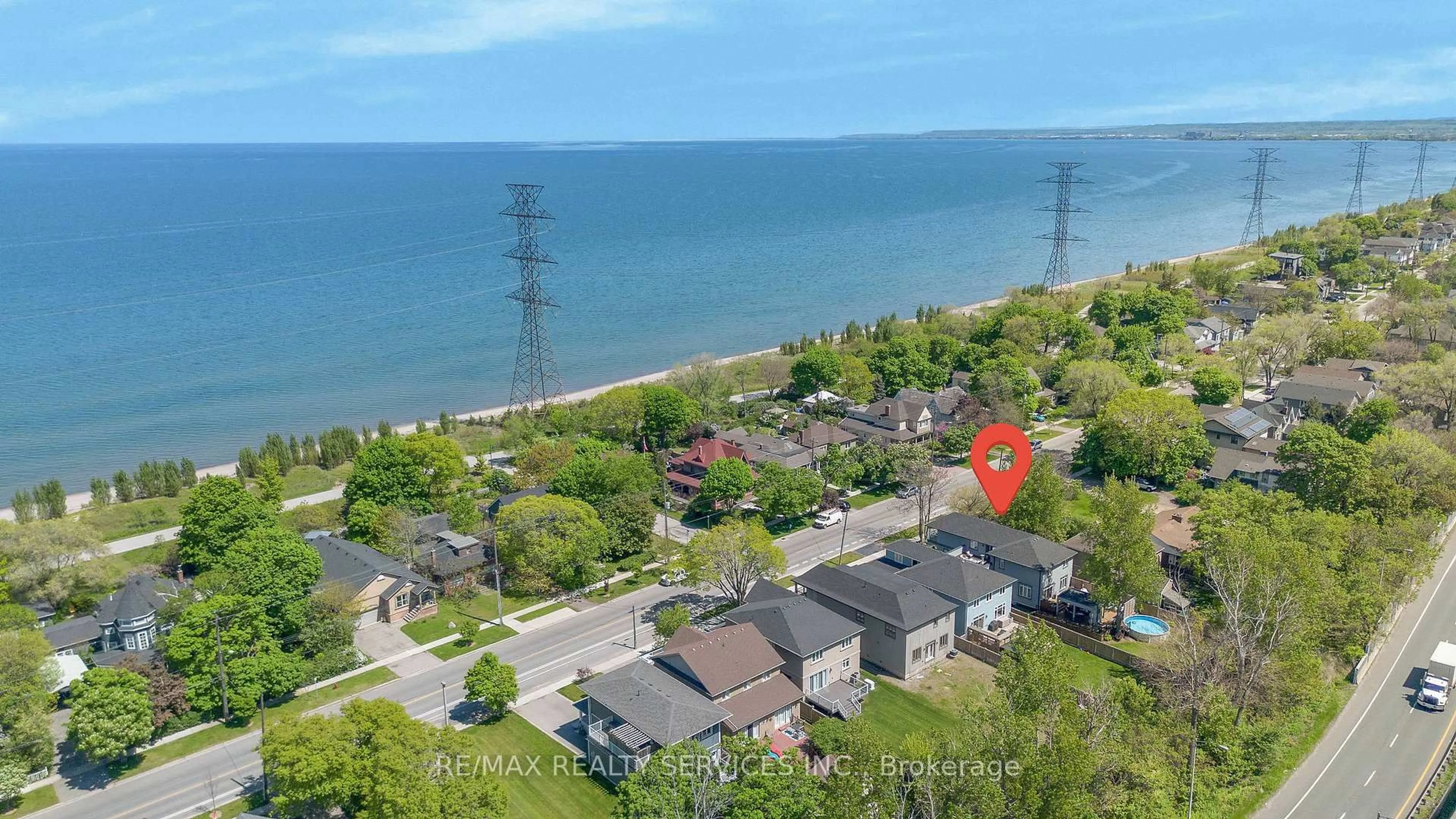 A pic from outside/outdoor area/front of a property/back of a property/a pic from drone, water/lake/river/ocean view for 958 Beach Blvd, Hamilton Ontario L8H 6Z4