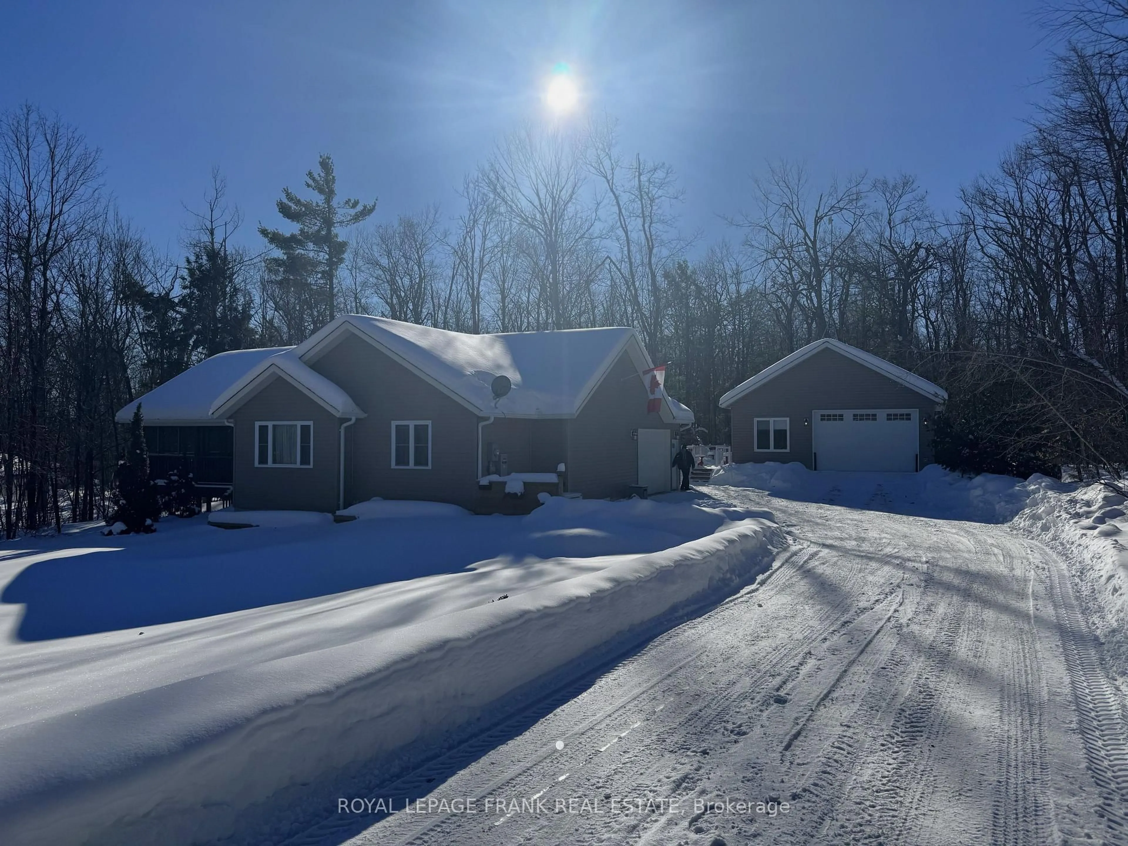A pic from outside/outdoor area/front of a property/back of a property/a pic from drone, street for 25 Lakeland Ave, Trent Lakes Ontario K0L 1J0