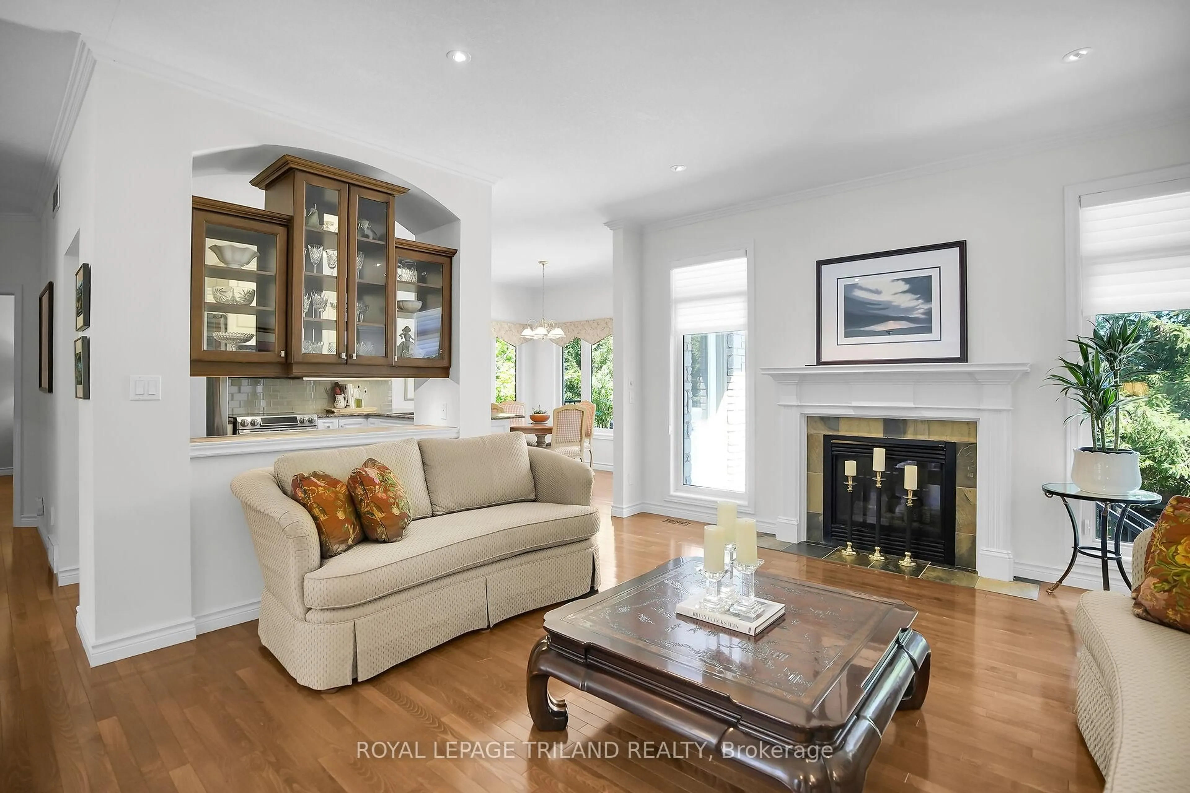 Living room with furniture, wood/laminate floor for 26 Butternut Lane, London South Ontario N6K 4J4