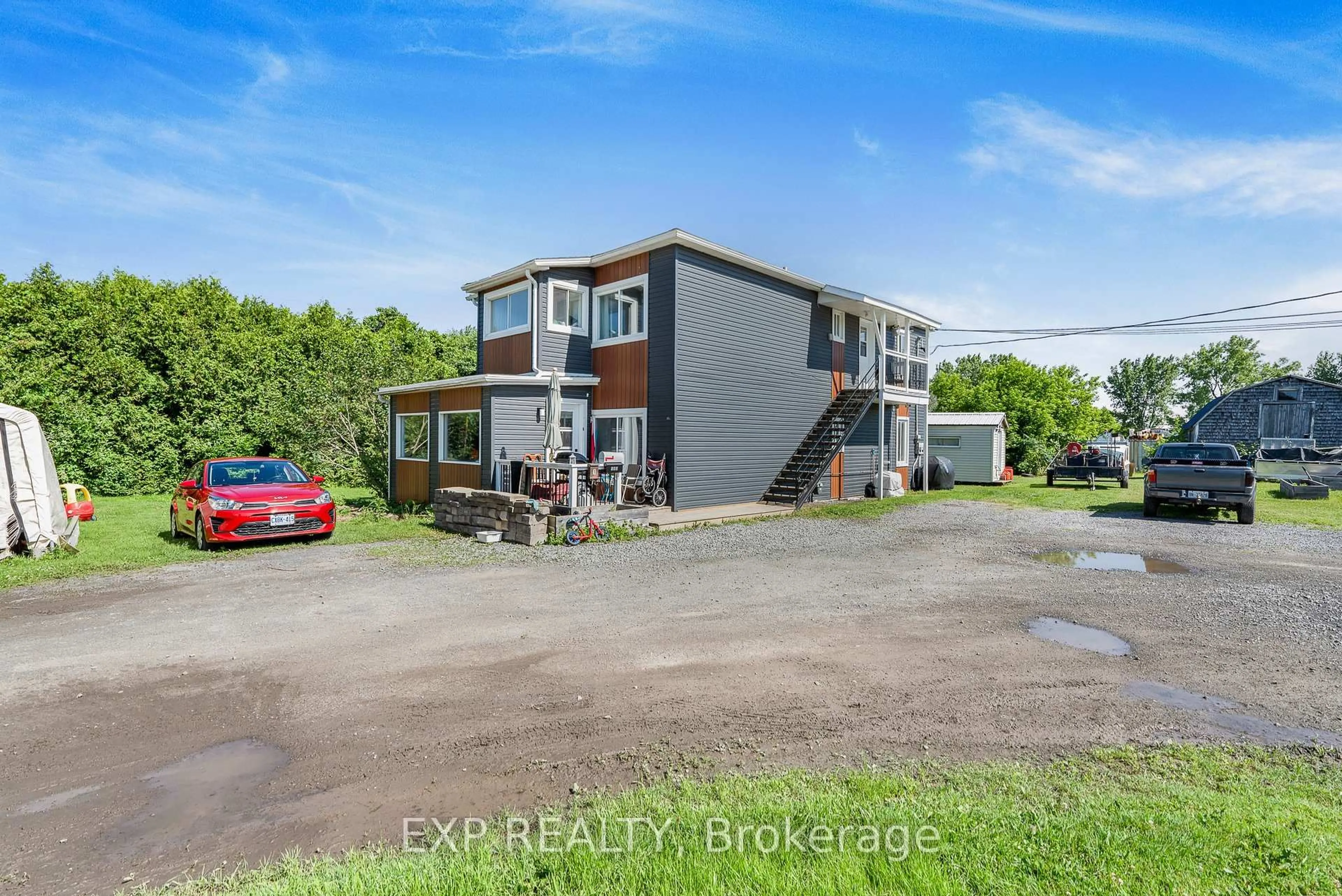 A pic from outside/outdoor area/front of a property/back of a property/a pic from drone, unknown for 309-313 Front Rd, Hawkesbury Ontario K6A 2T1