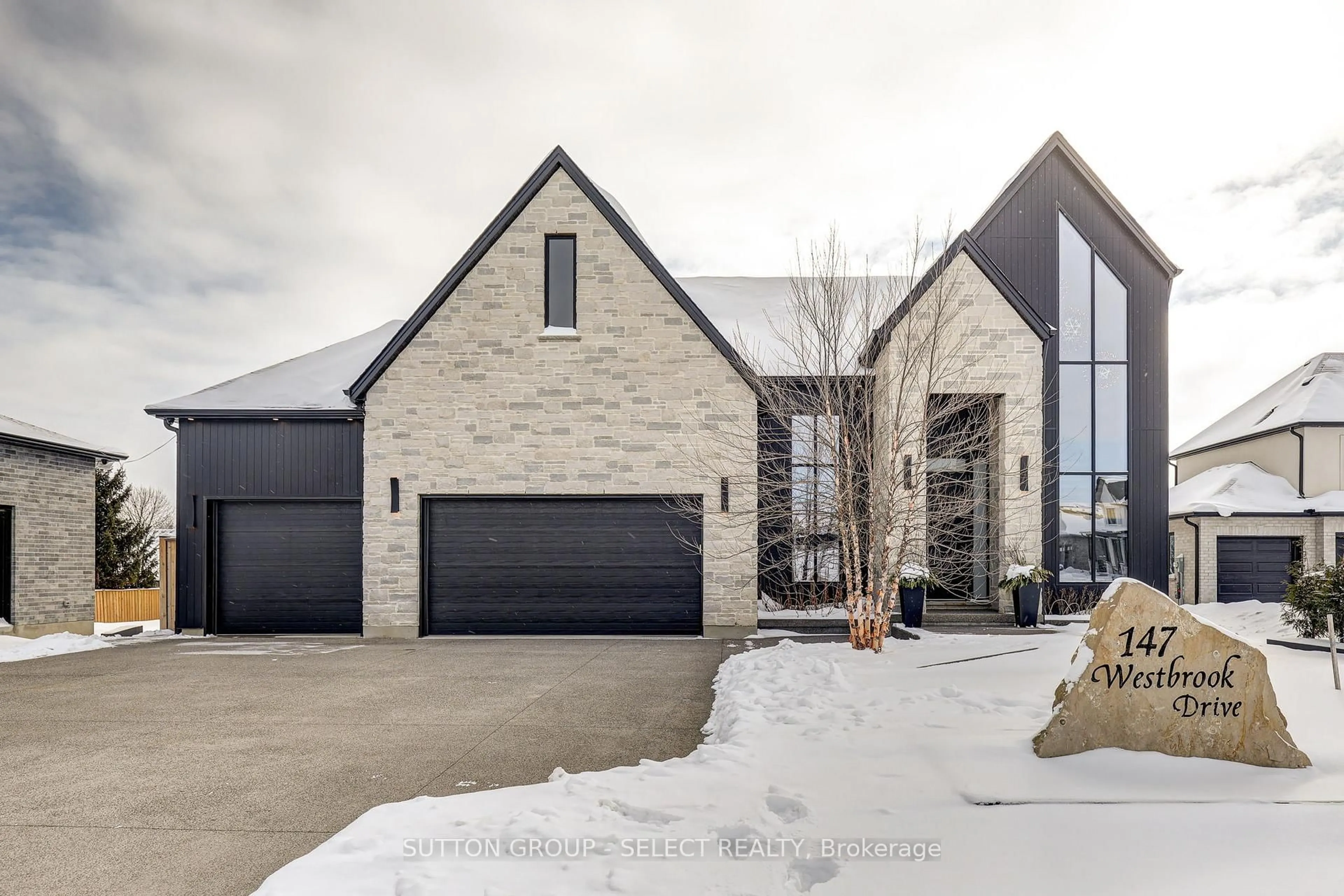 Home with brick exterior material, street for 147 Westbrook Dr, Middlesex Centre Ontario N0L 1R0