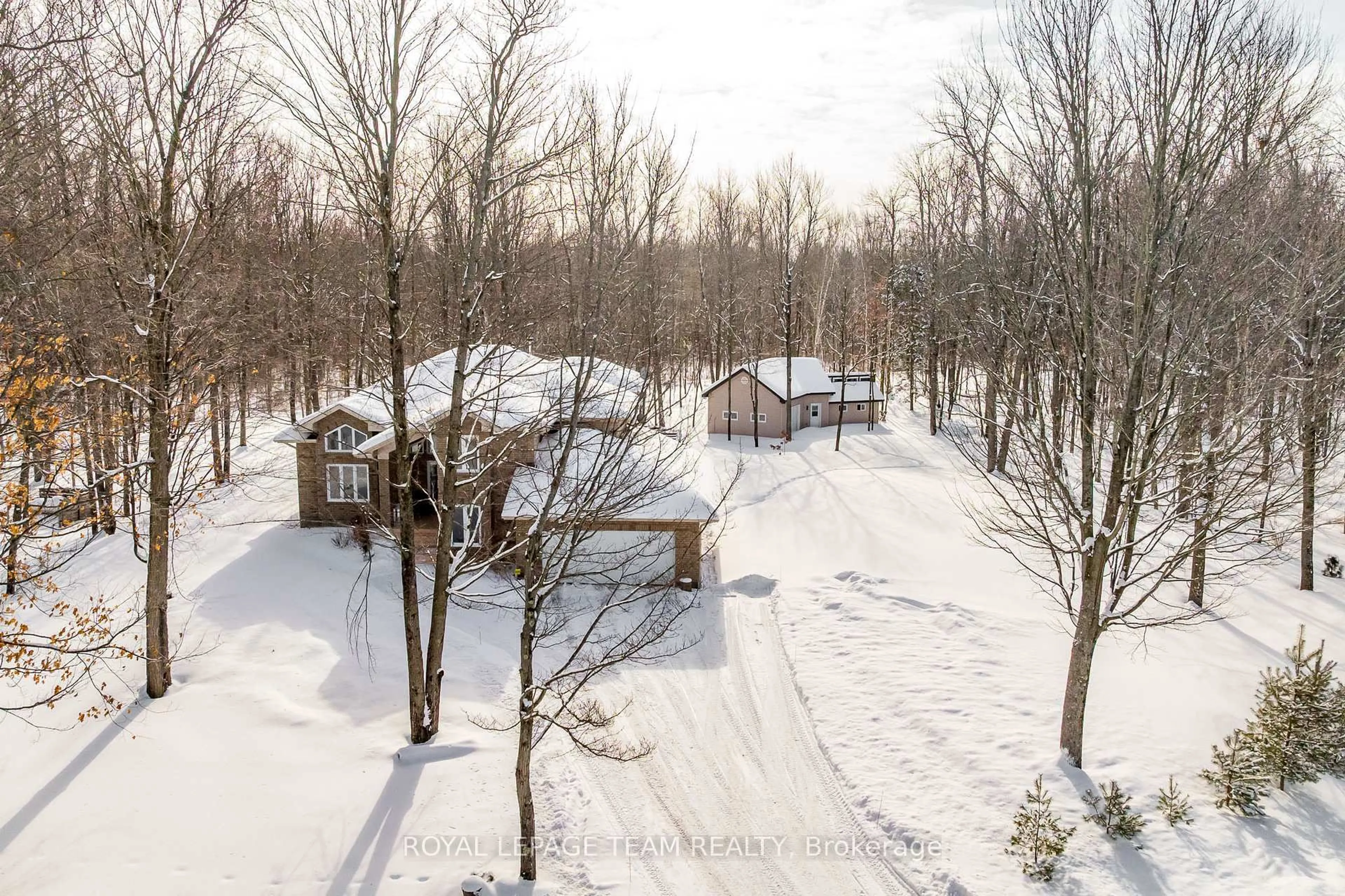 A pic from outside/outdoor area/front of a property/back of a property/a pic from drone, forest/trees view for 5830 Wood Duck Dr, Osgoode Ontario K0A 2W0