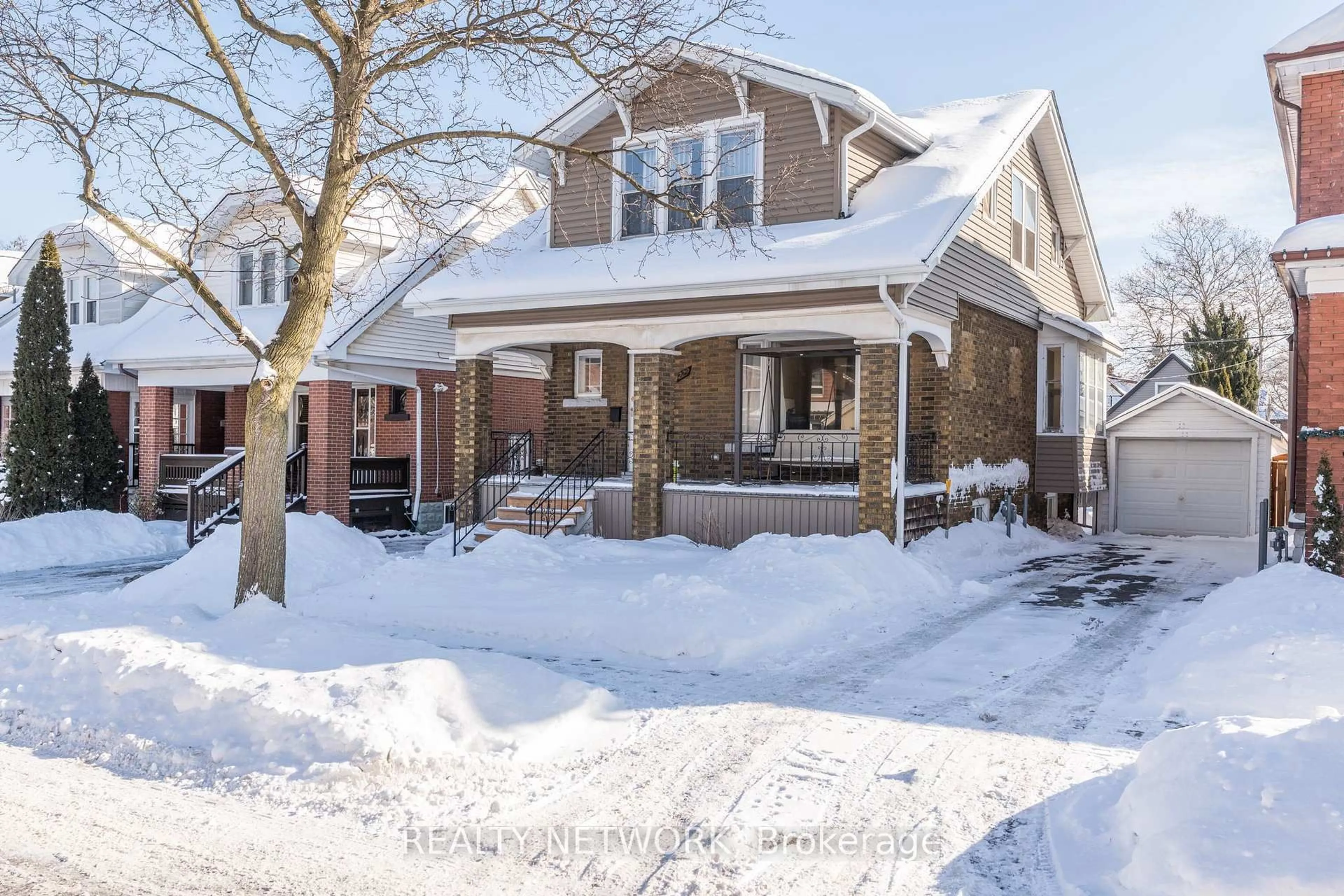 Home with brick exterior material, street for 229 Park Row, Hamilton Ontario L8K 2K4