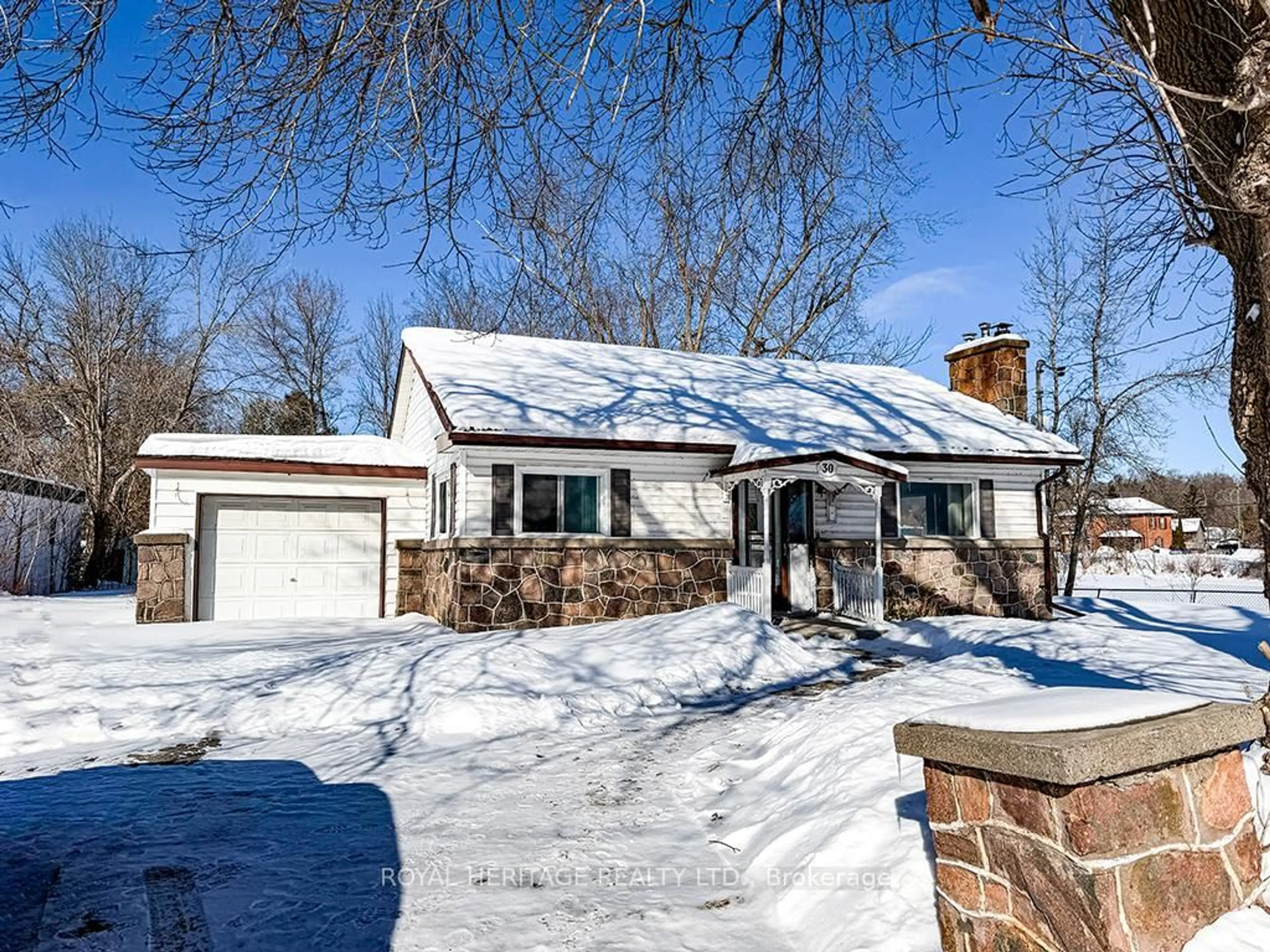 Home with brick exterior material, street for 30 Bridge St, Tweed Ontario K0K 3J0