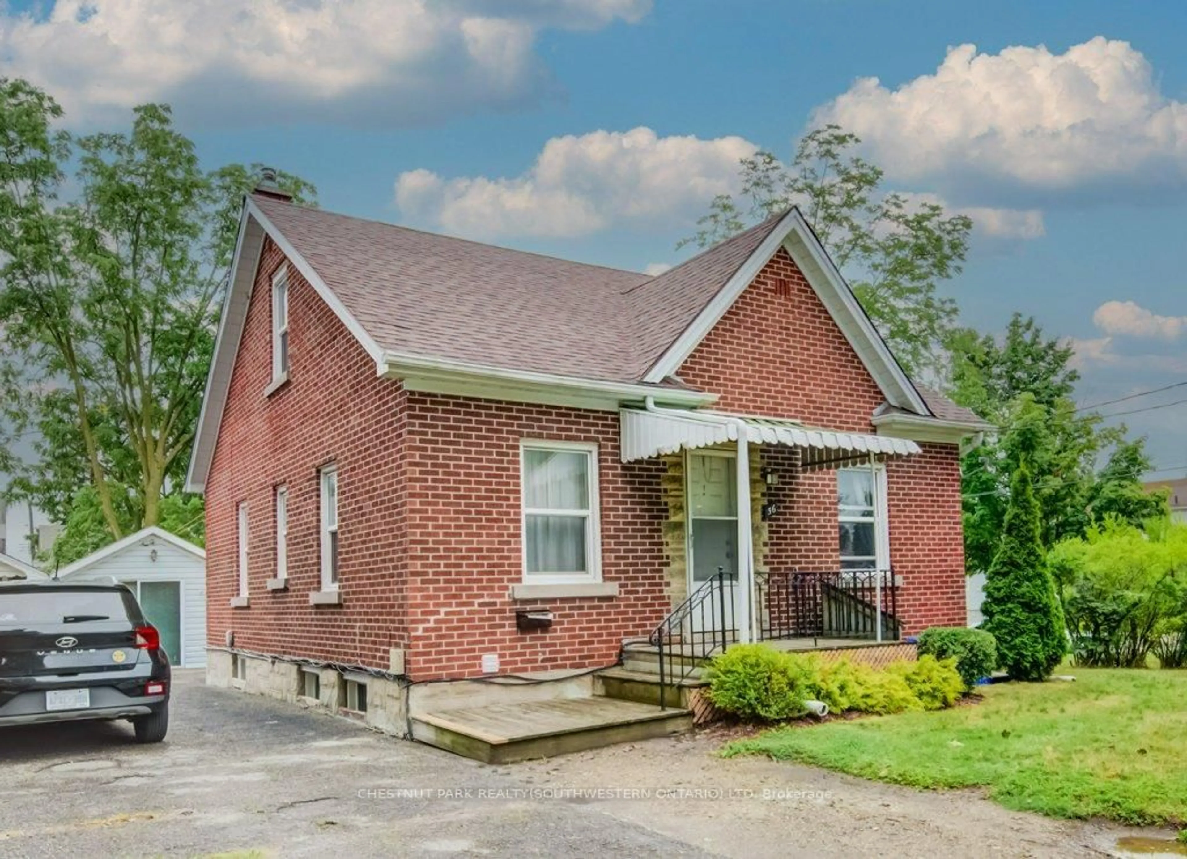 Home with brick exterior material, street for 56 Lilac St, Waterloo Ontario N2G 3A8