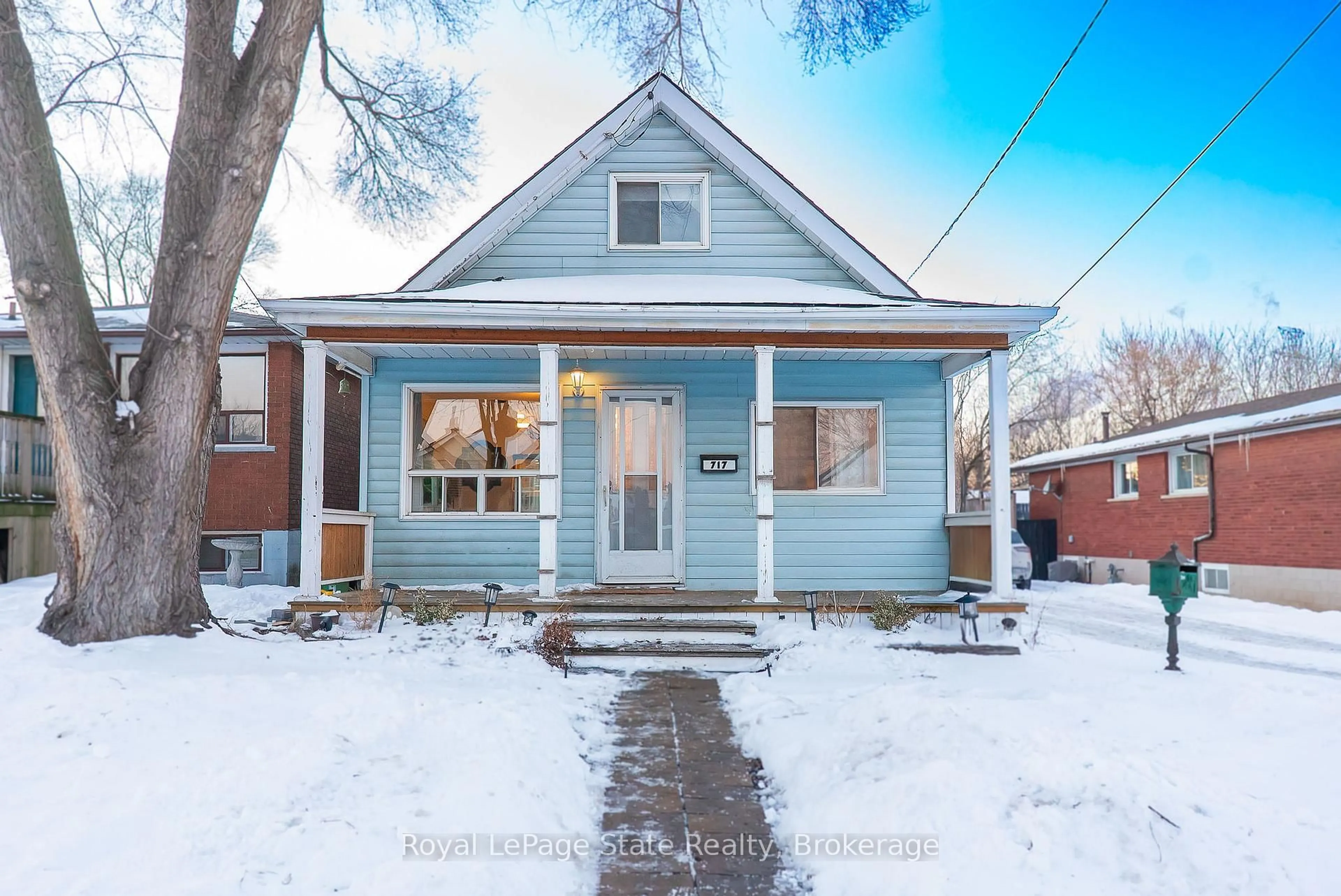 Home with brick exterior material, street for 717 Knox Ave, Hamilton Ontario L8H 6K7