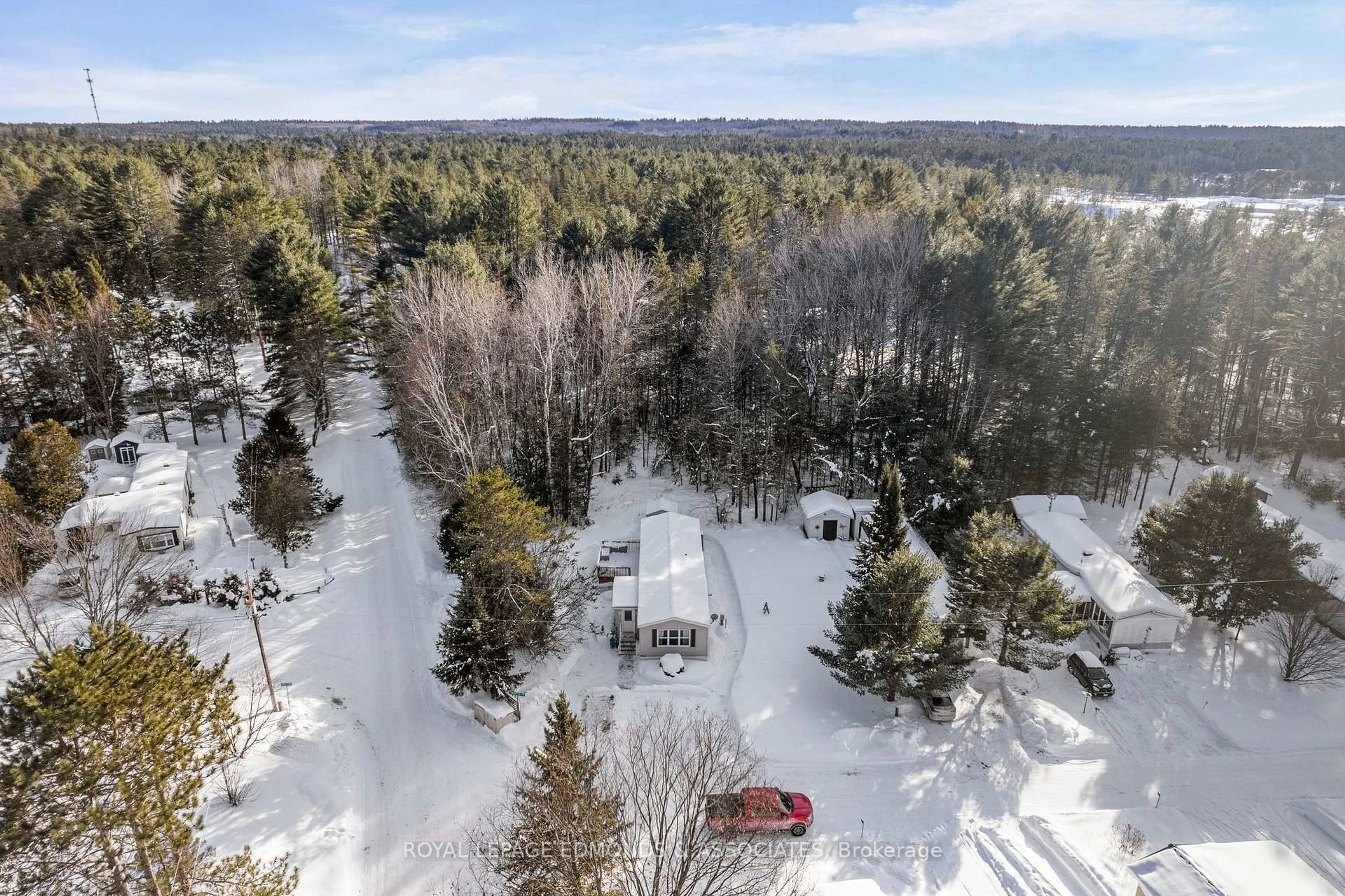 A pic from outside/outdoor area/front of a property/back of a property/a pic from drone, forest/trees view for 5 Hunter's Run Lane, Chalk River Ontario K0J 1J0