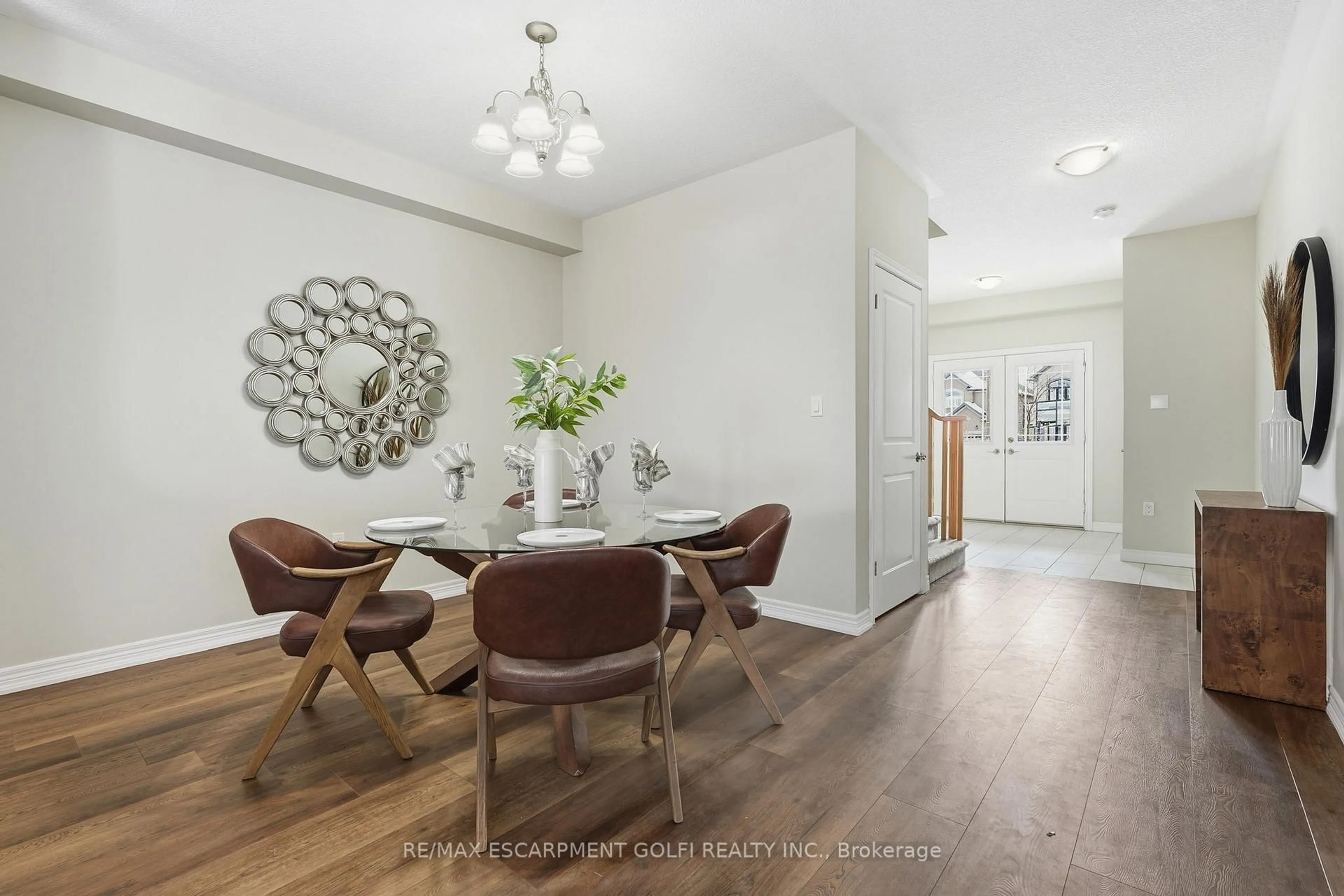 Dining room, wood/laminate floor for 107 Dolomiti Crt, Hamilton Ontario L0R 1P0