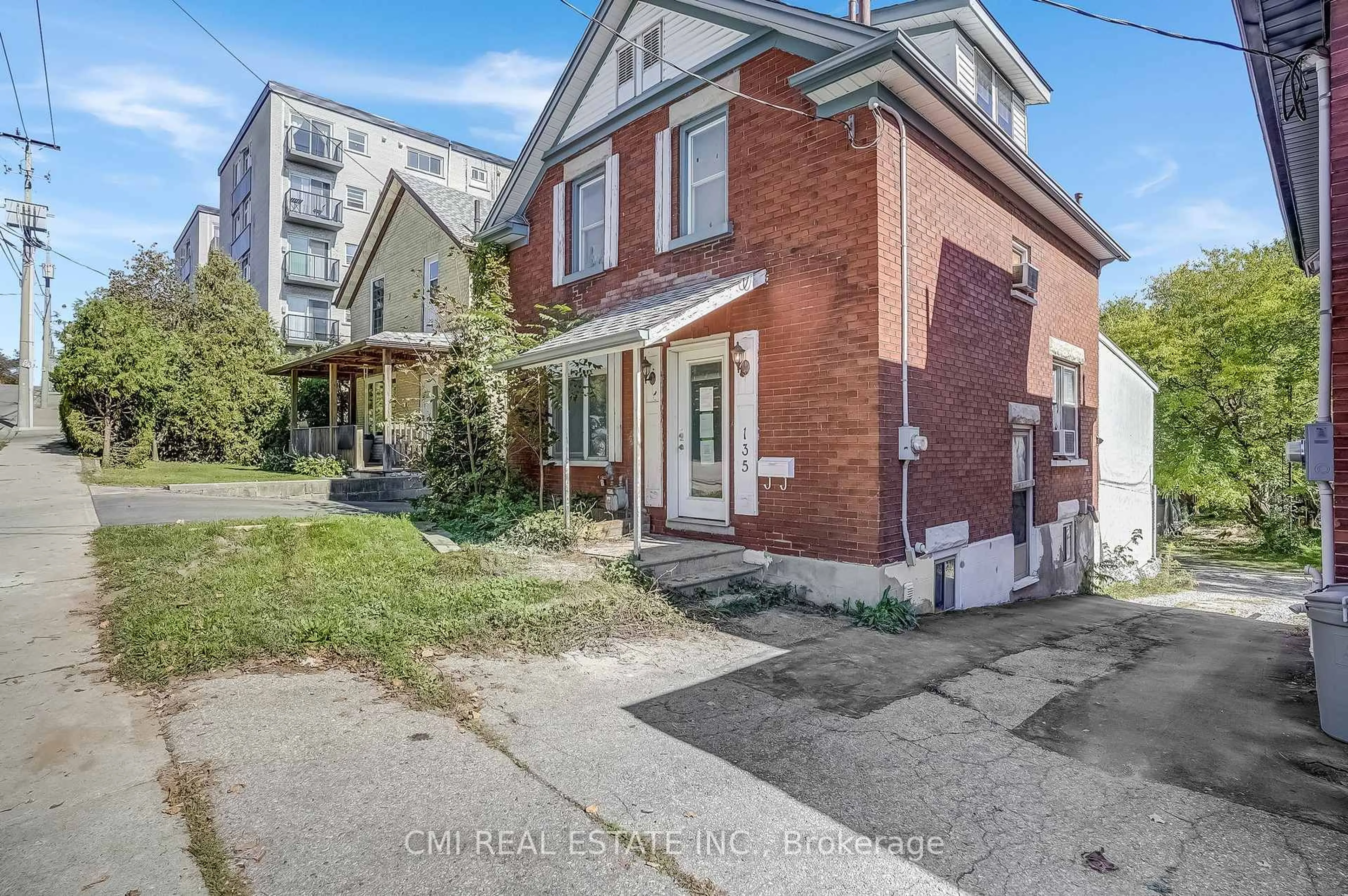 Home with brick exterior material, street for 135 Madison Ave, Kitchener Ontario N2G 3M4