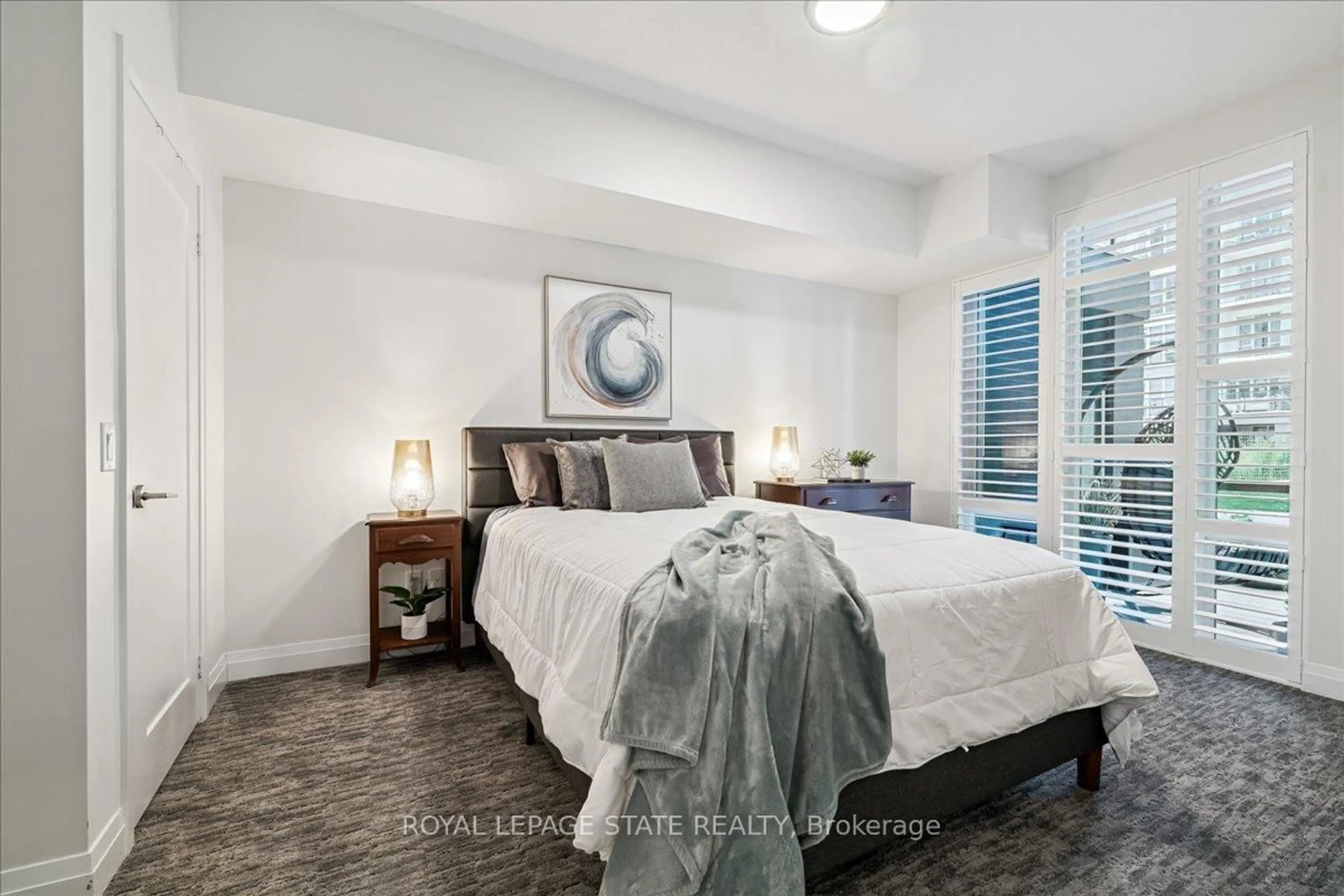 Bedroom with bed, unknown for 16 Concord Pl #150, Grimsby Ontario L3M 0J1