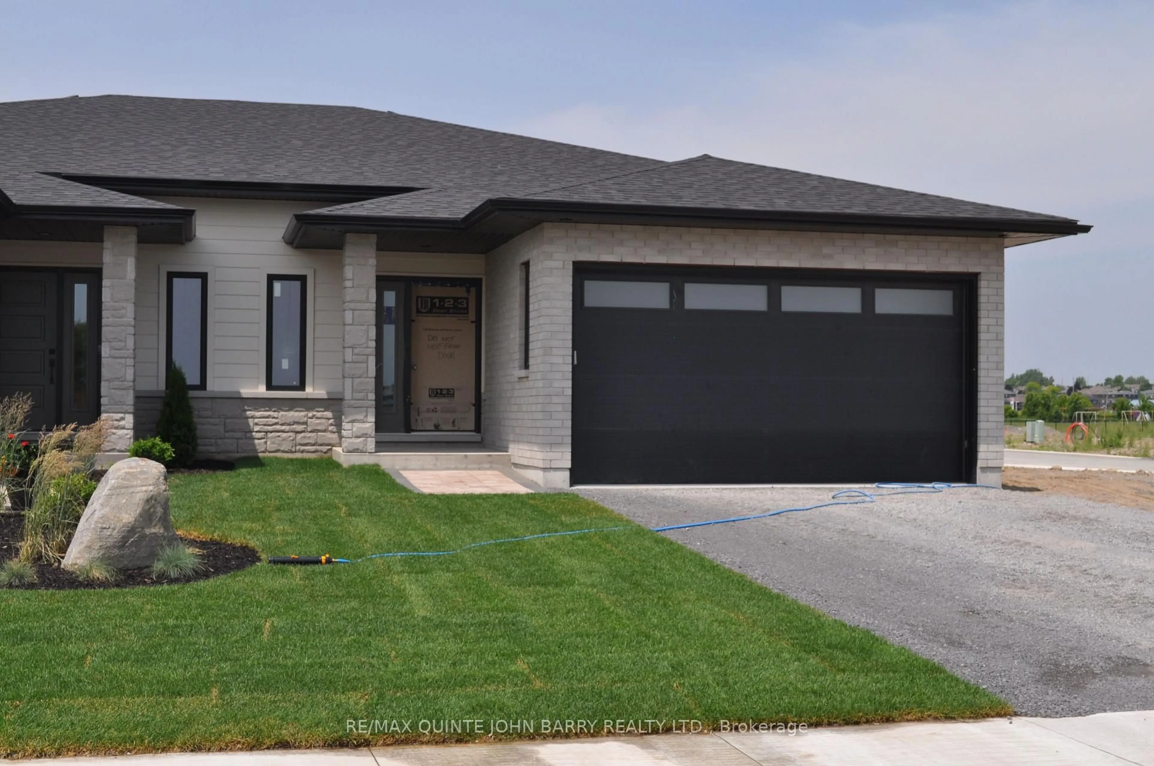 Home with brick exterior material, street for 27 Parkland Circ #Lot 42, Quinte West Ontario K8V 0R3