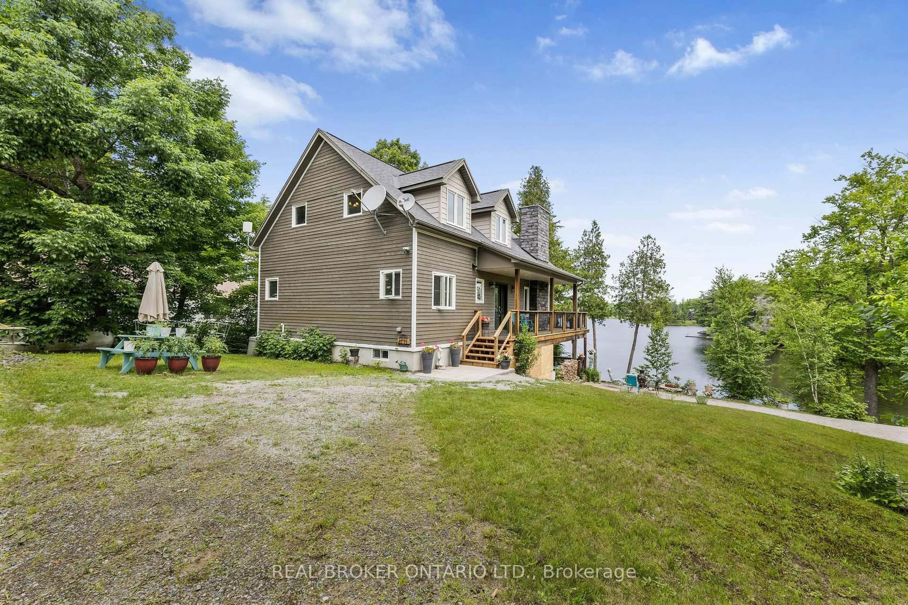A pic from outside/outdoor area/front of a property/back of a property/a pic from drone, water/lake/river/ocean view for 1 McKowen Rd, McKellar Ontario P0G 1C0