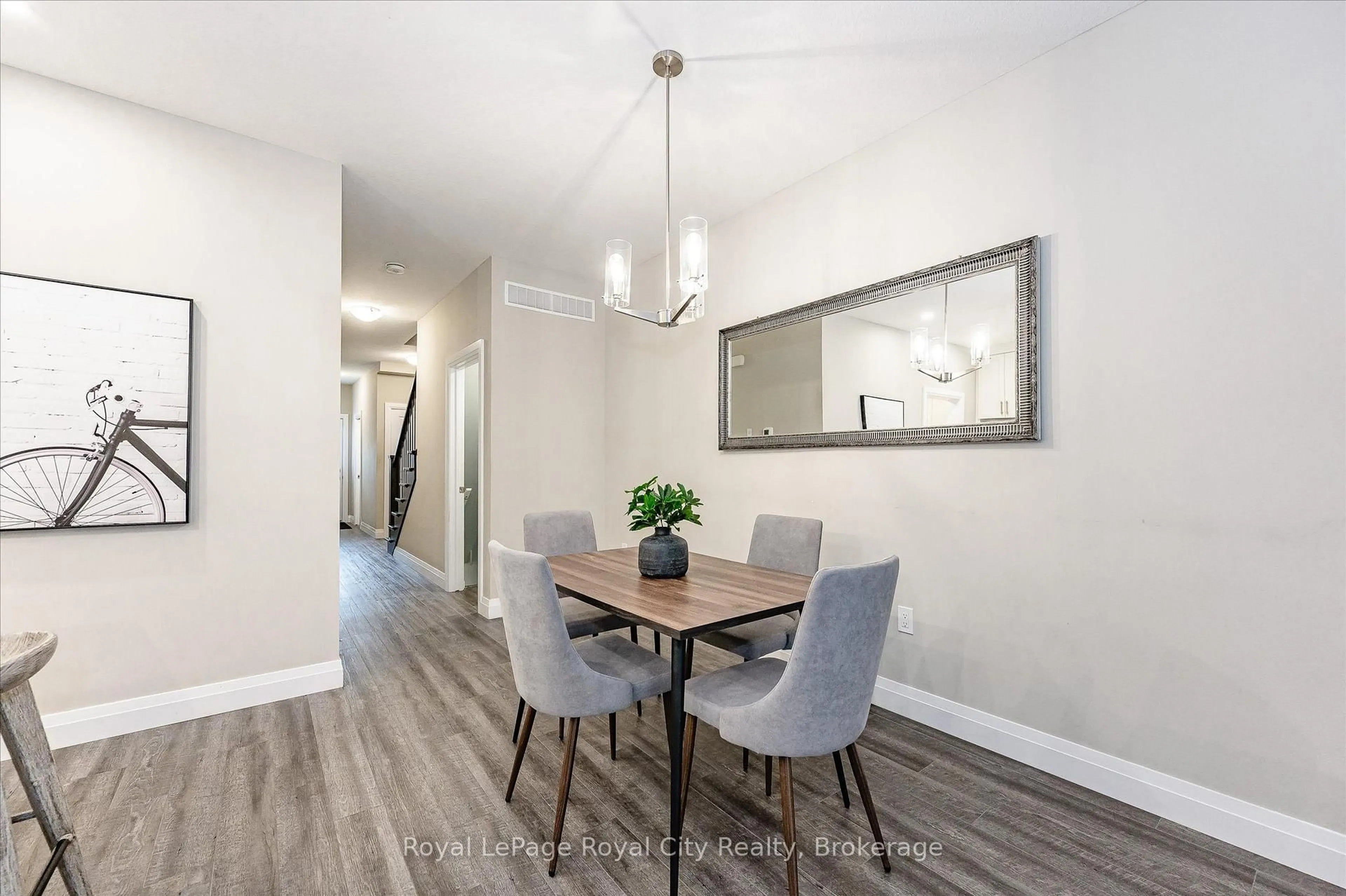 Dining room, wood/laminate floor for 35 WIDEMAN Blvd #3, Guelph Ontario N1E 0J2