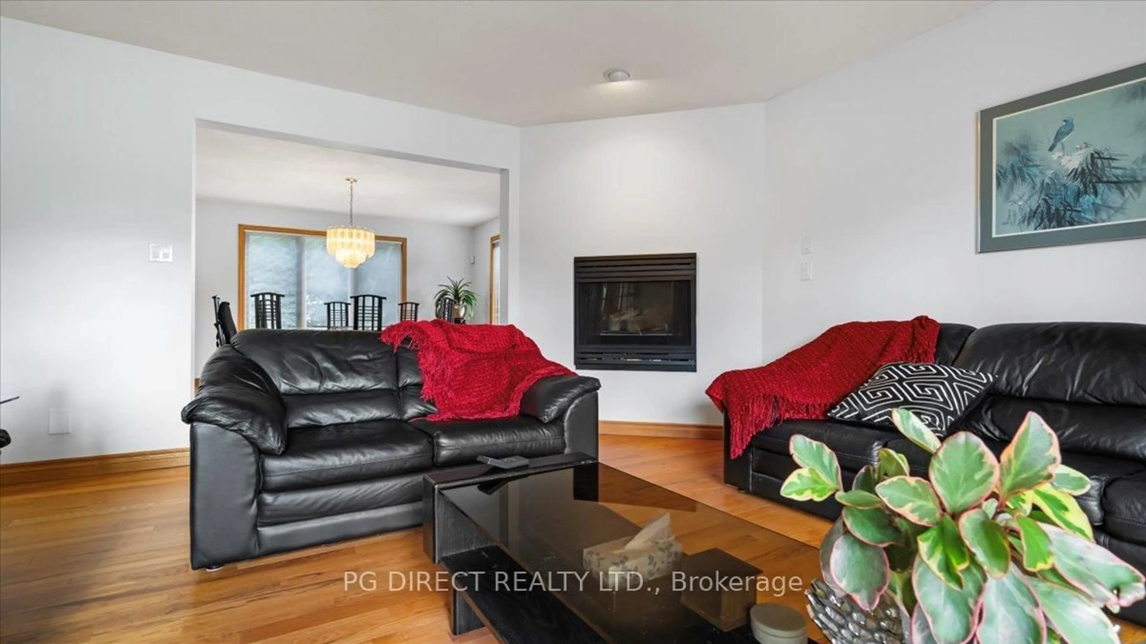 Living room with furniture, wood/laminate floor for 26 Bridlewood Lane, Quinte West Ontario K8V 6N4