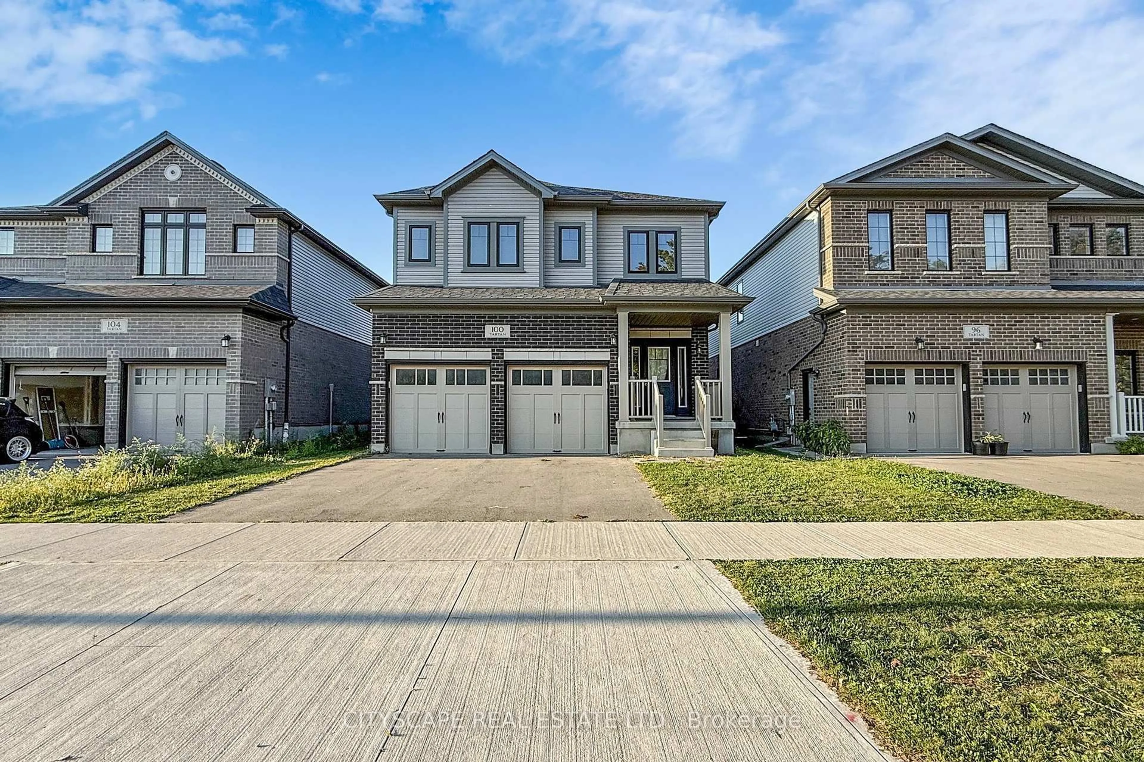 Home with brick exterior material, street for 100 Tartan Ave, Kitchener Ontario N2R 0N5