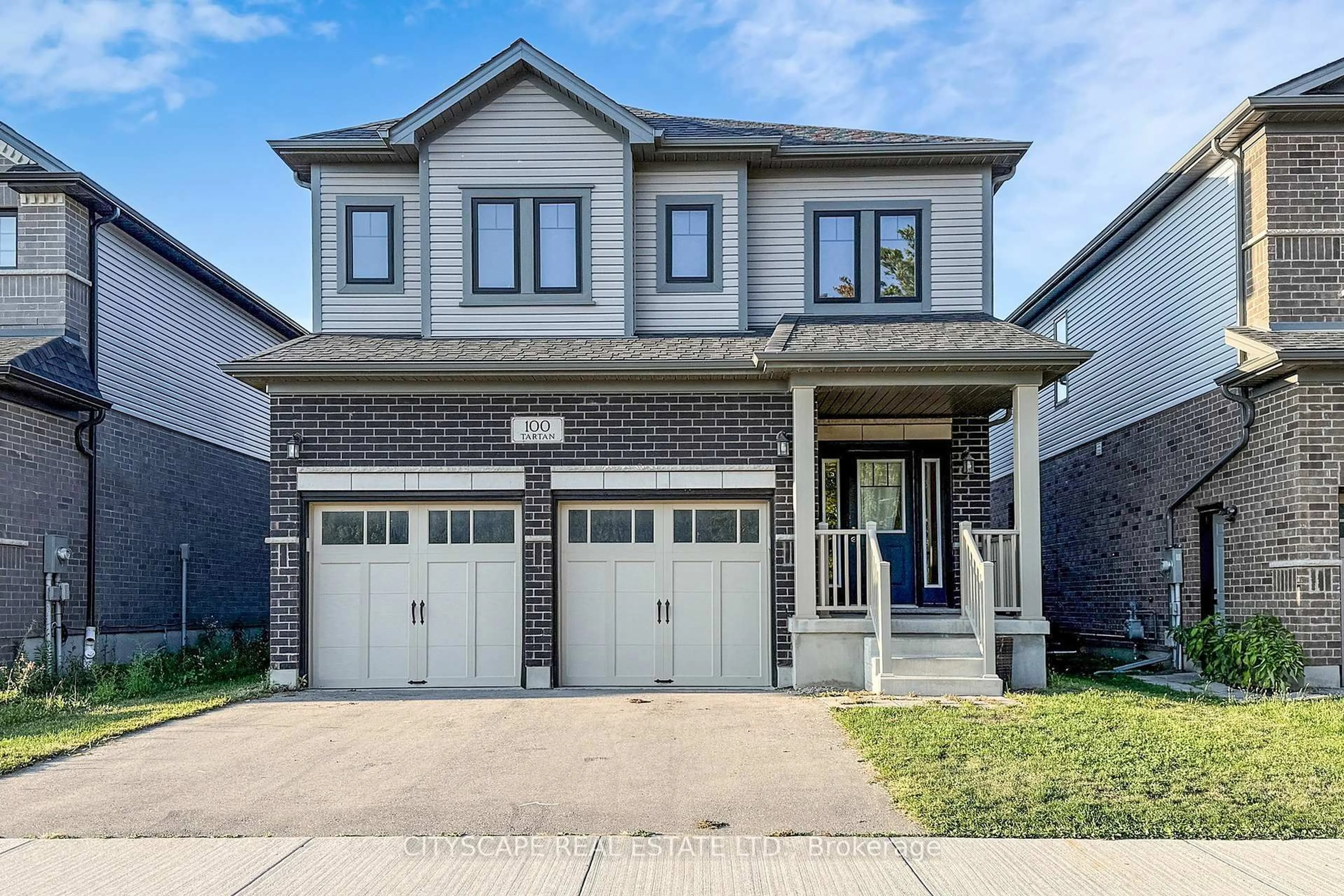 Home with brick exterior material, street for 100 Tartan Ave, Kitchener Ontario N2R 0N5