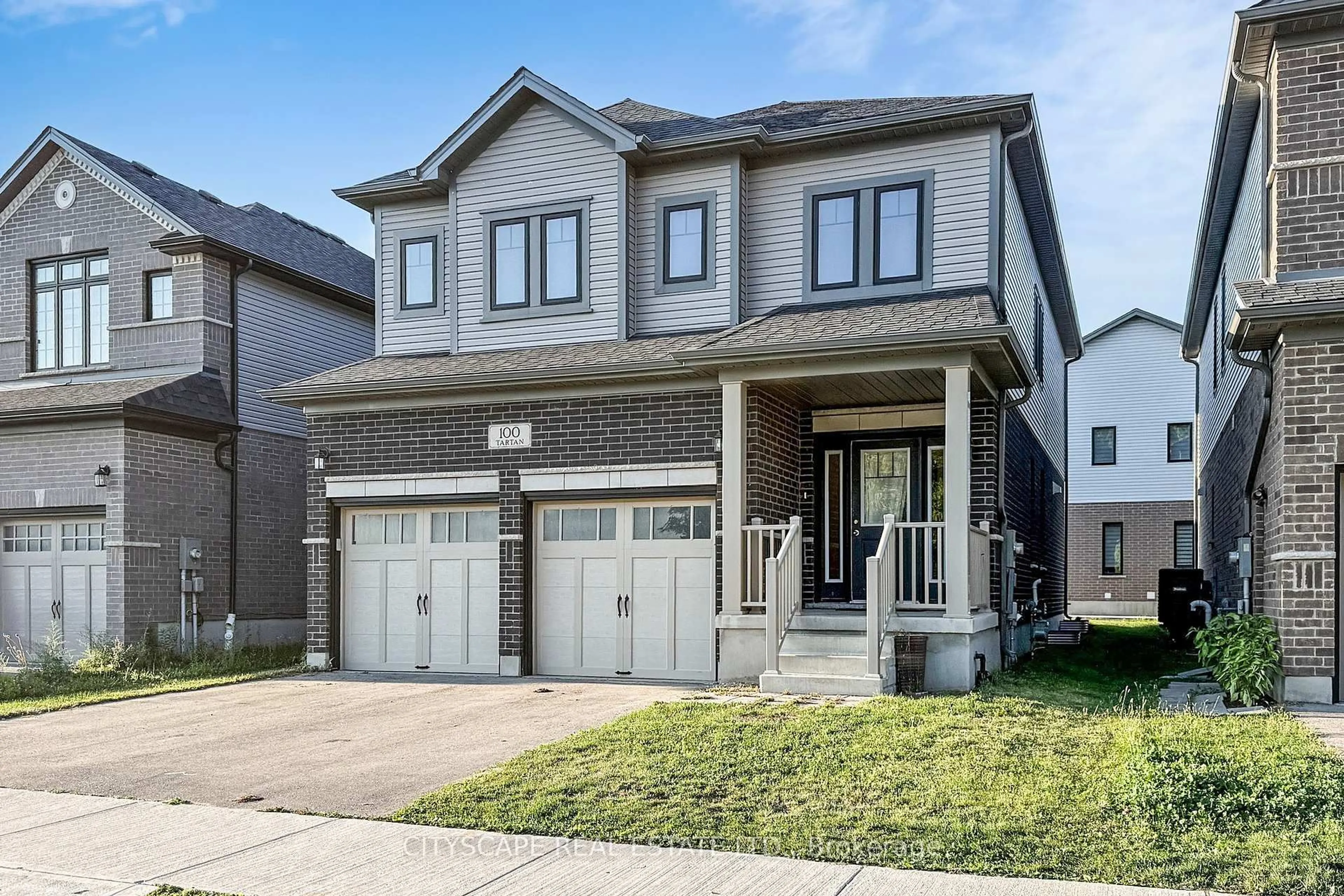 Home with brick exterior material, street for 100 Tartan Ave, Kitchener Ontario N2R 0N5