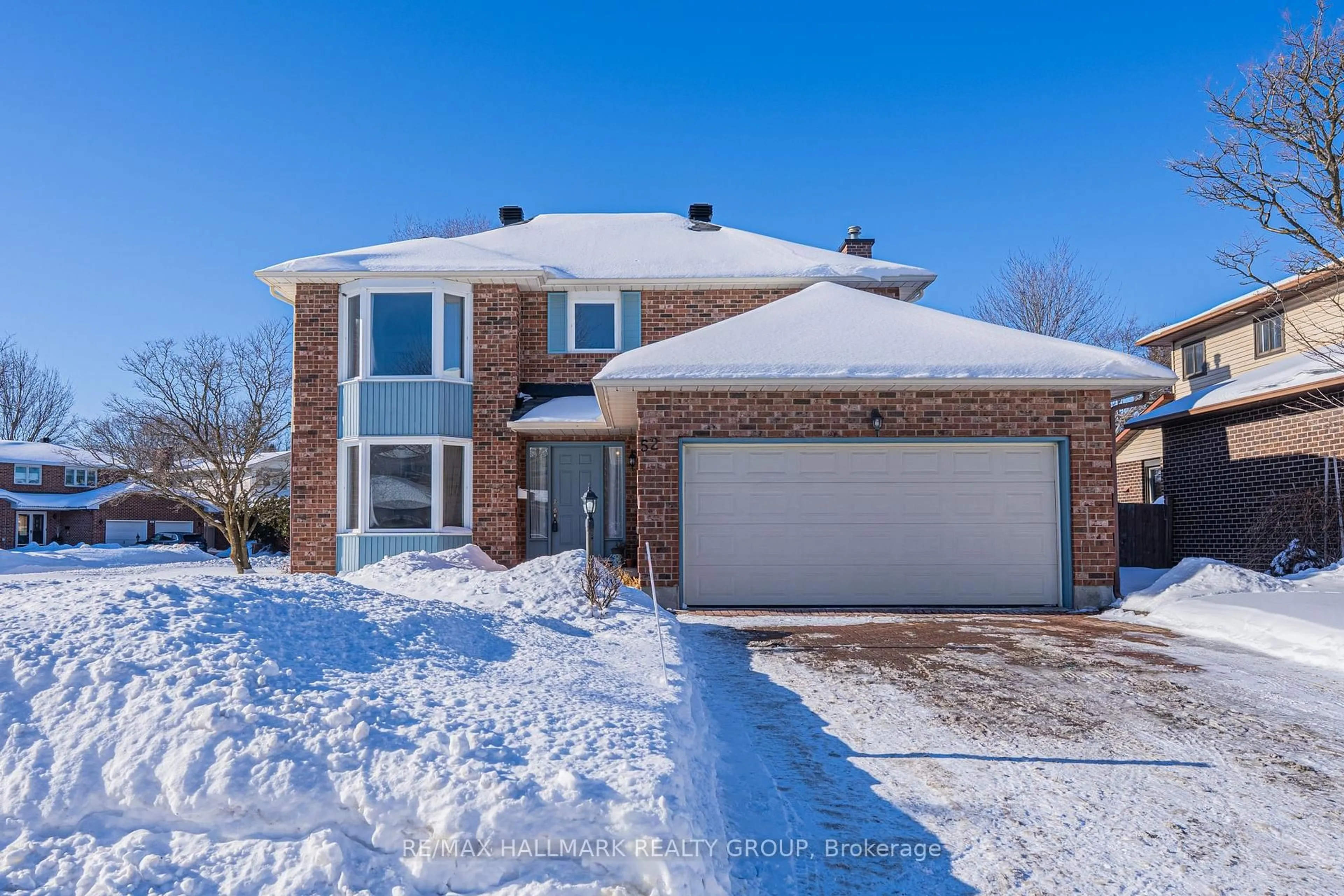Home with brick exterior material, street for 52 Thare Cres, Barrhaven Ontario K2J 2P5