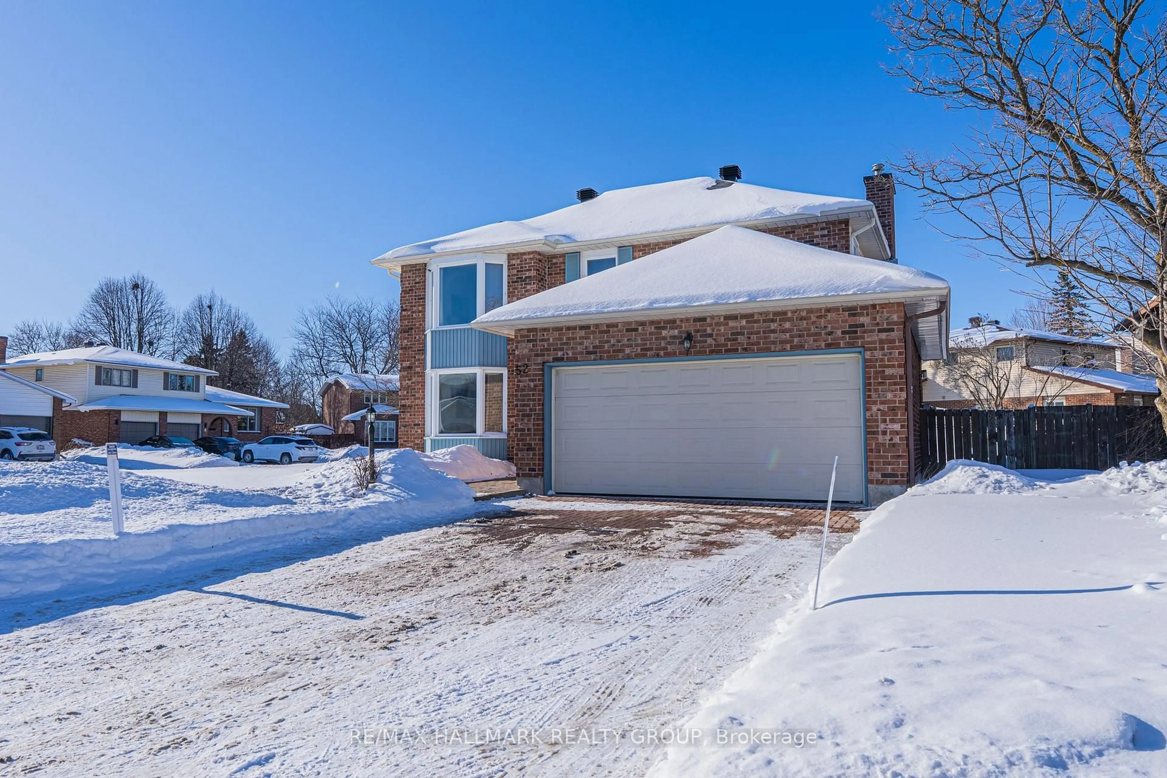 Home with brick exterior material, street for 52 Thare Cres, Barrhaven Ontario K2J 2P5