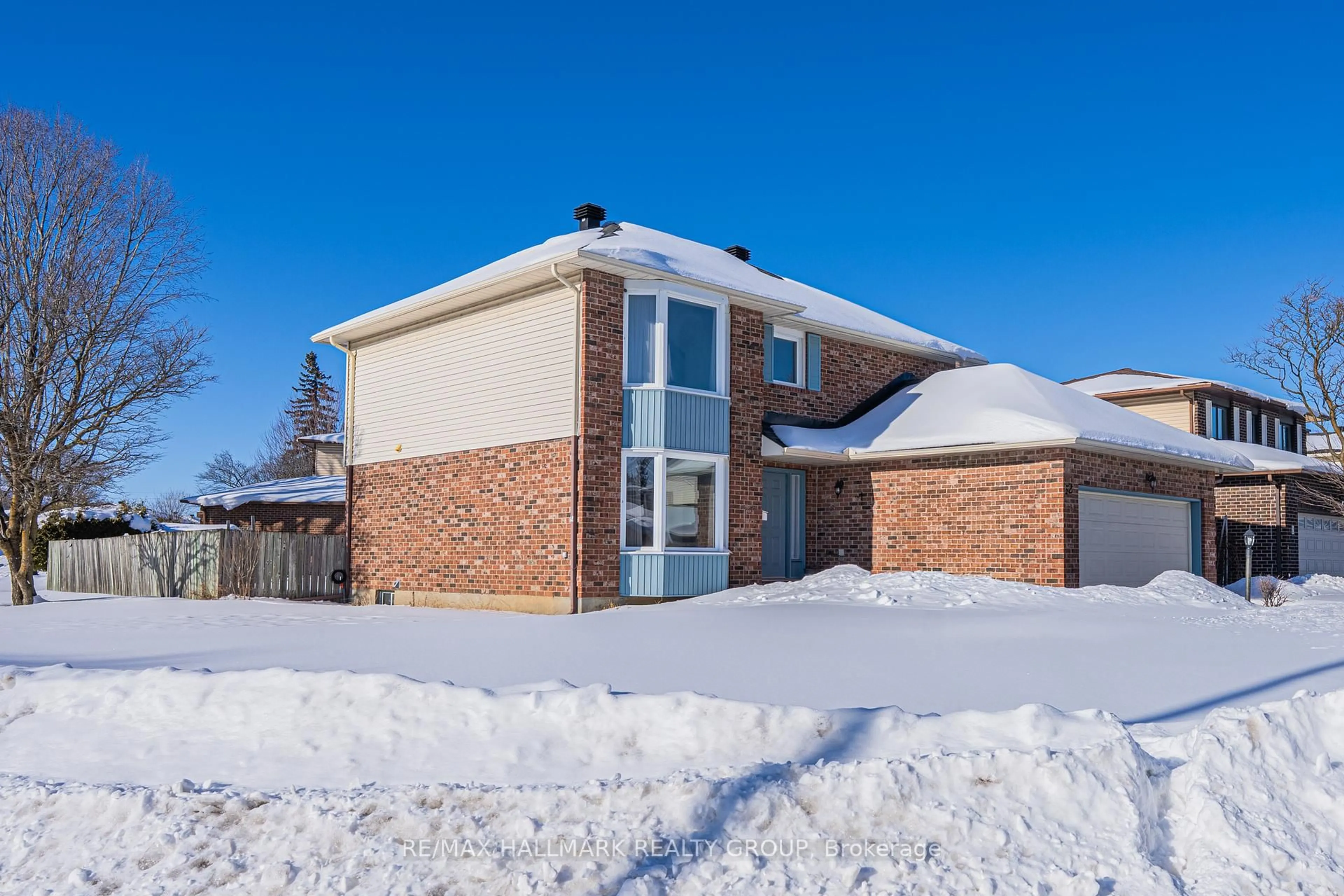 Home with brick exterior material, street for 52 Thare Cres, Barrhaven Ontario K2J 2P5