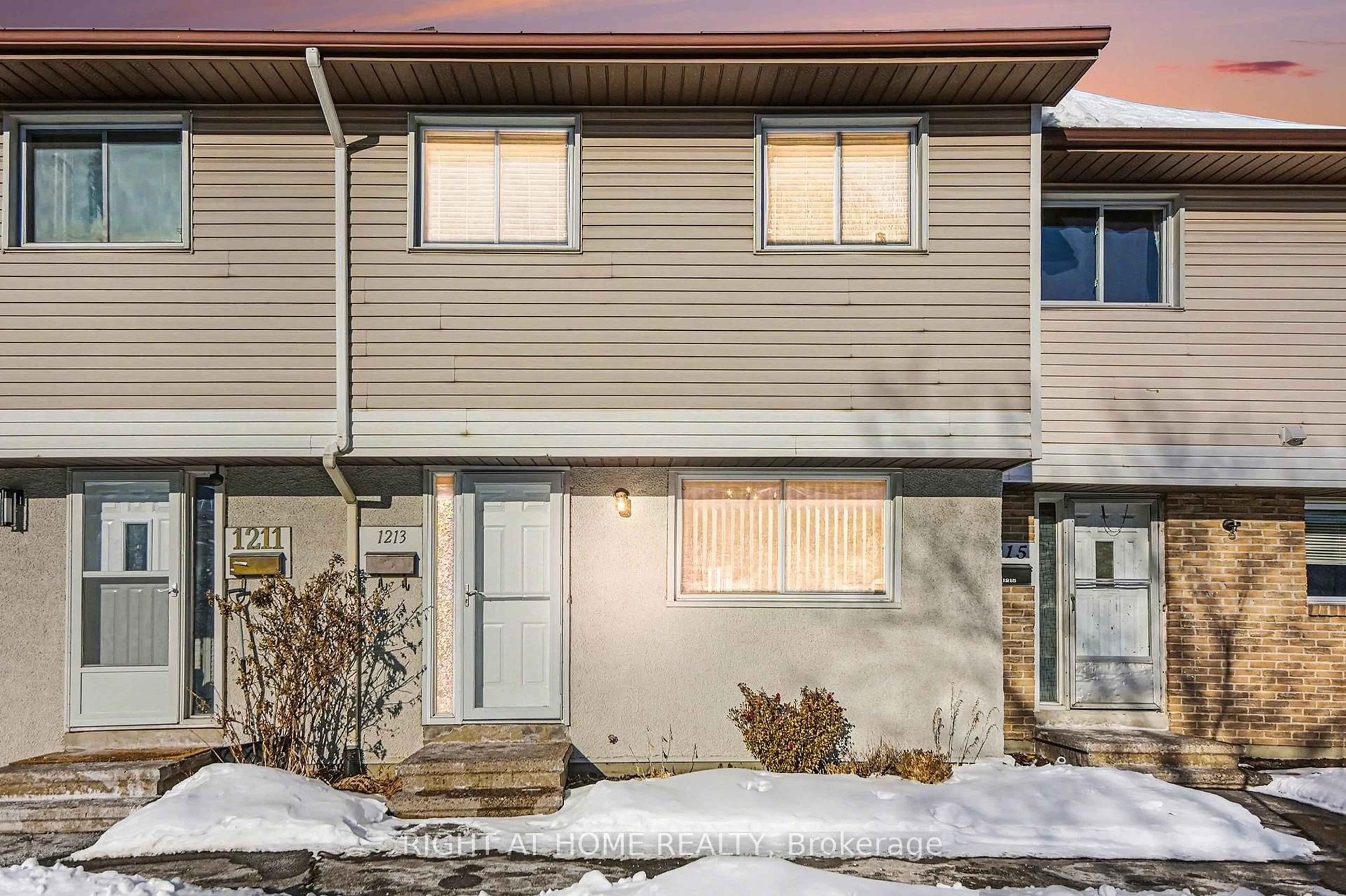 Home with vinyl exterior material, street for 1213 Bowmount St #51, Ottawa Ontario K1J 8T3