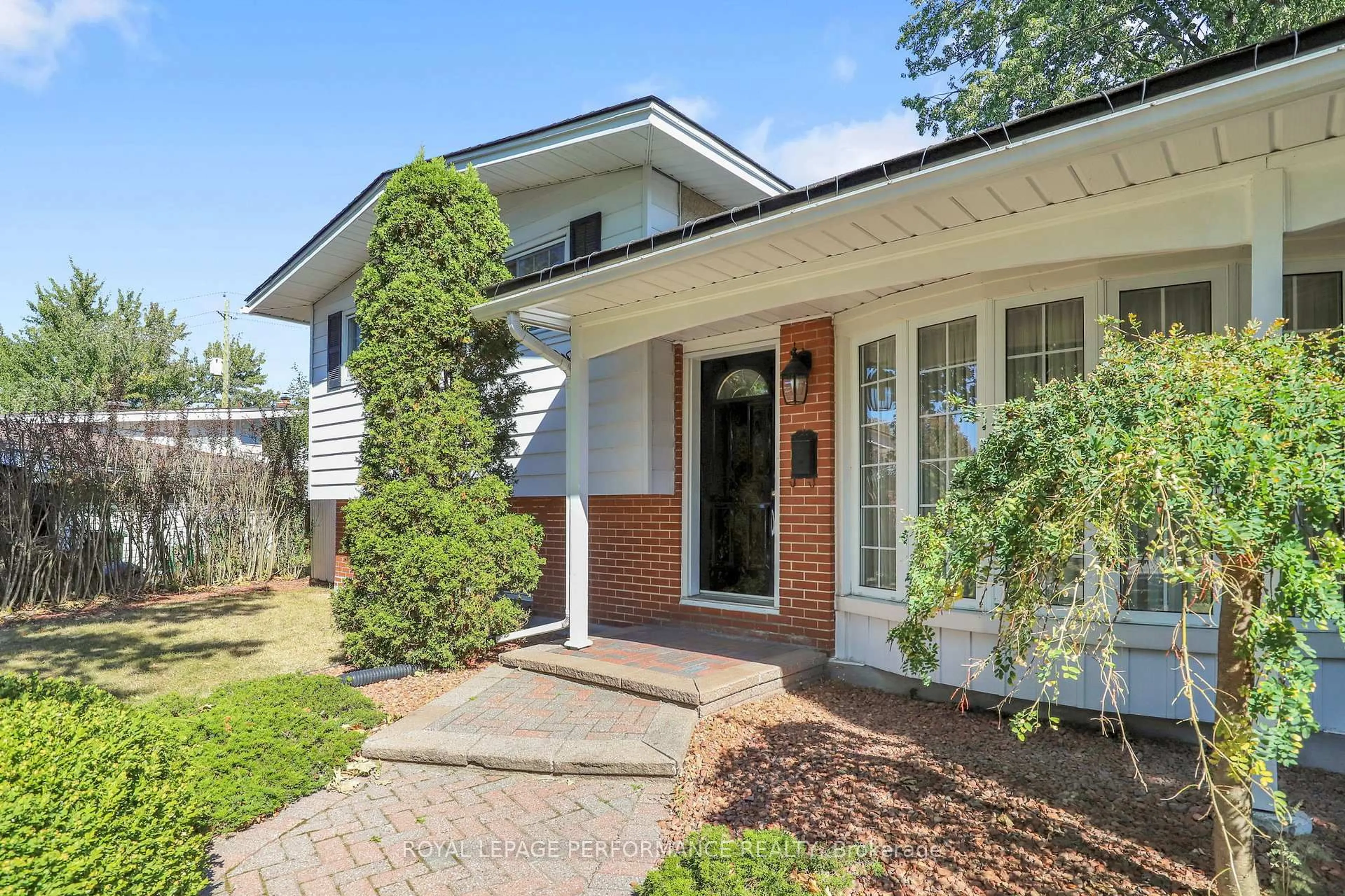 Home with brick exterior material, street for 2337 Samuel Dr, Ottawa Ontario K1G 3C3