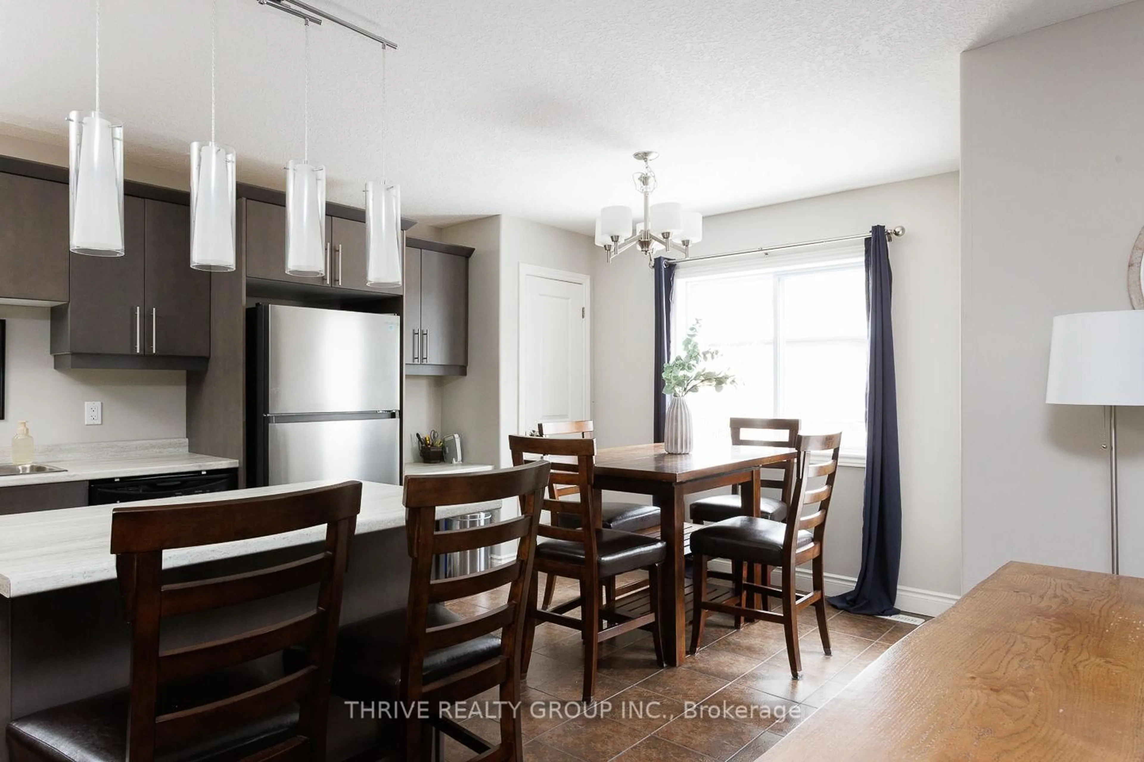 Dining room, wood/laminate floor for 33 ABBOTT St, Strathroy-Caradoc Ontario N7G 0B6