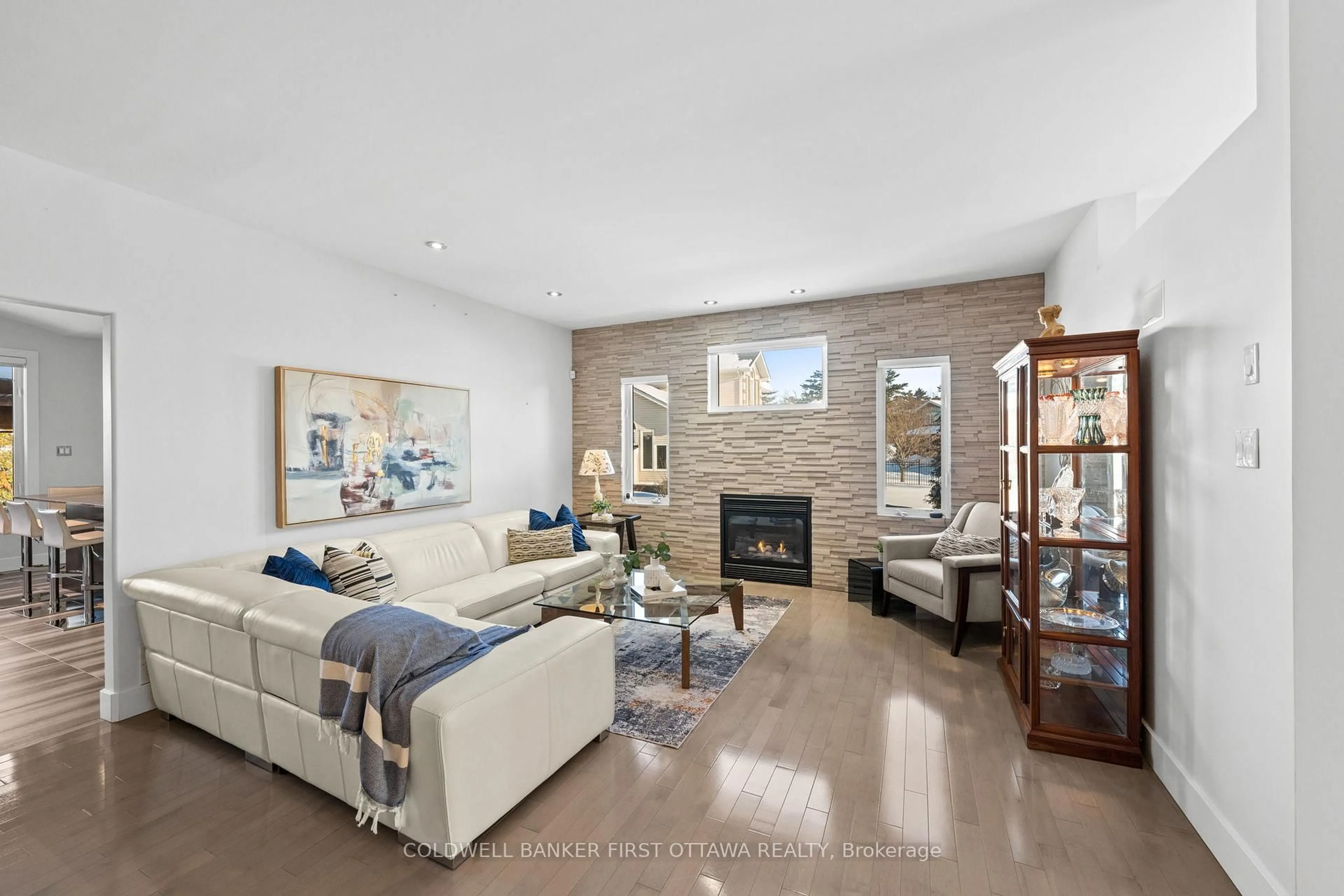 Living room with furniture, ceramic/tile floor for 1828 Heatherstone Cres, Ottawa Ontario K4A 4P2