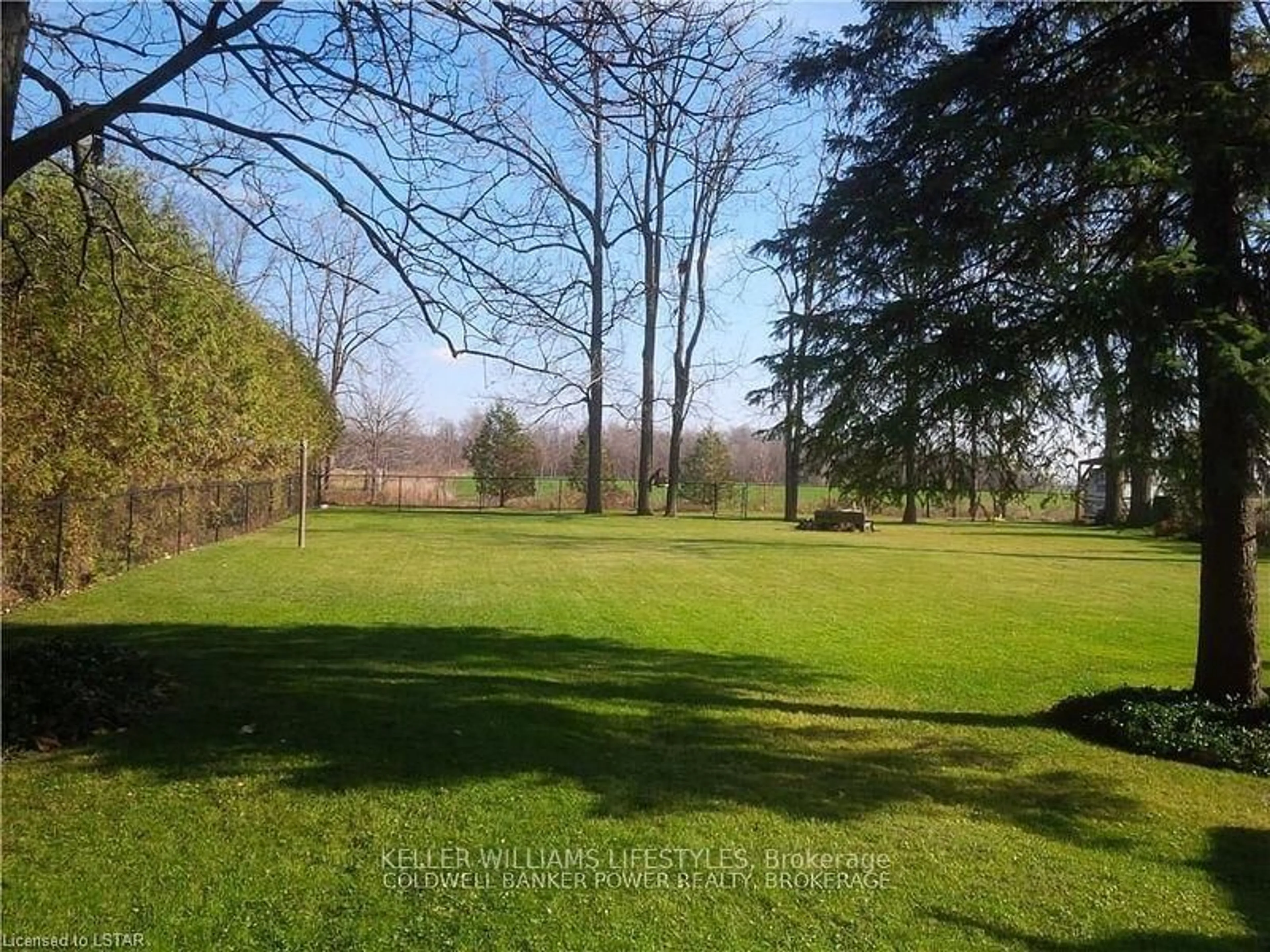 A pic from outside/outdoor area/front of a property/back of a property/a pic from drone, forest/trees view for 23904 Denfield Rd, Middlesex Centre Ontario N0M 1P0