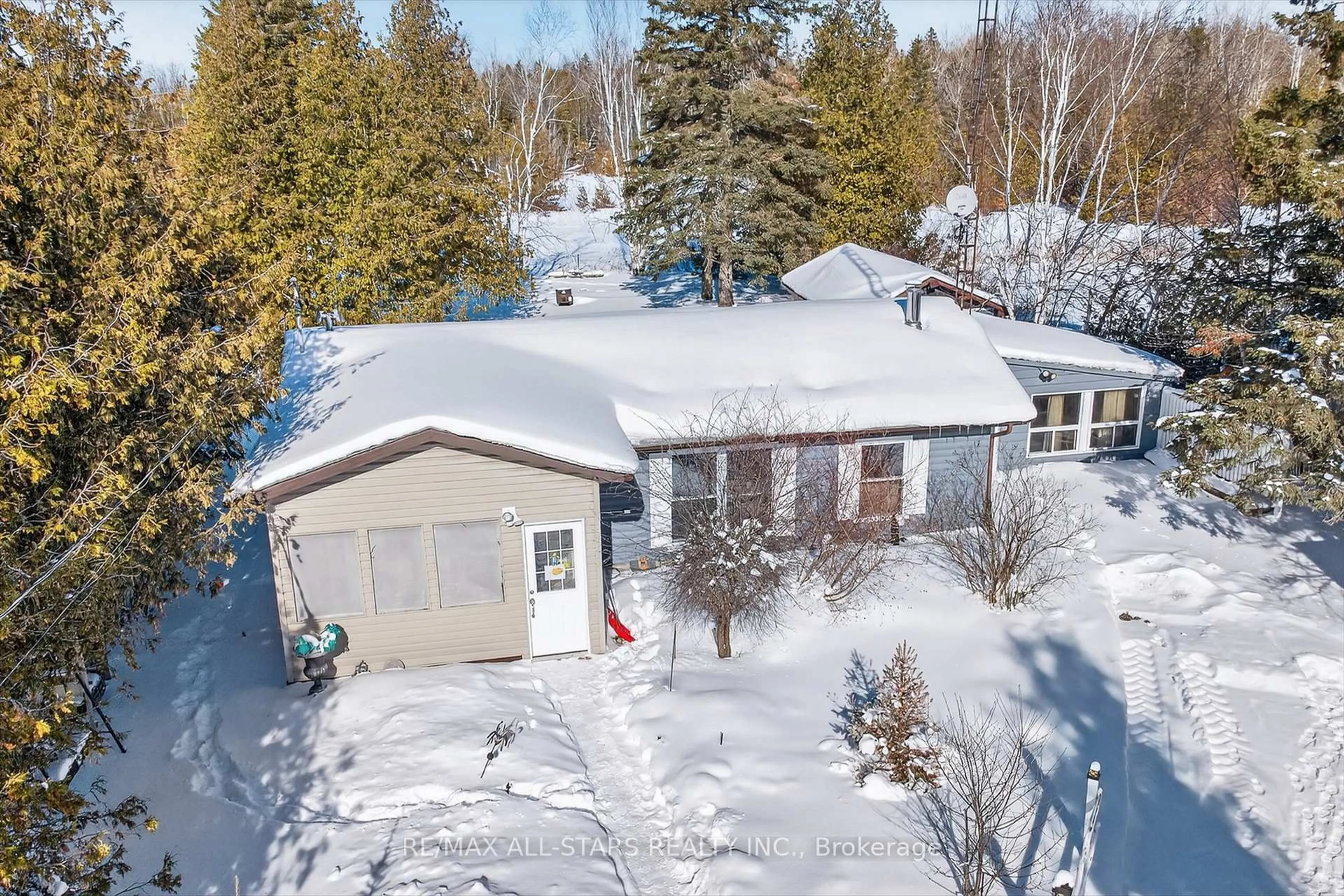 A pic from outside/outdoor area/front of a property/back of a property/a pic from drone, street for 220 McGuire Beach Rd, Kawartha Lakes Ontario K0M 2B0