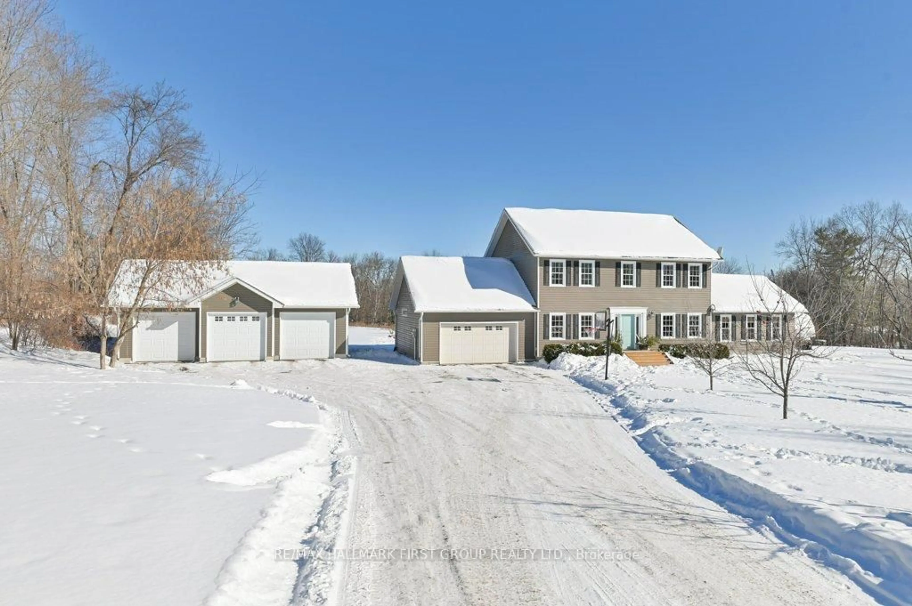 A pic from outside/outdoor area/front of a property/back of a property/a pic from drone, street for 104 Carss Rd, Tweed Ontario K0K 3J0