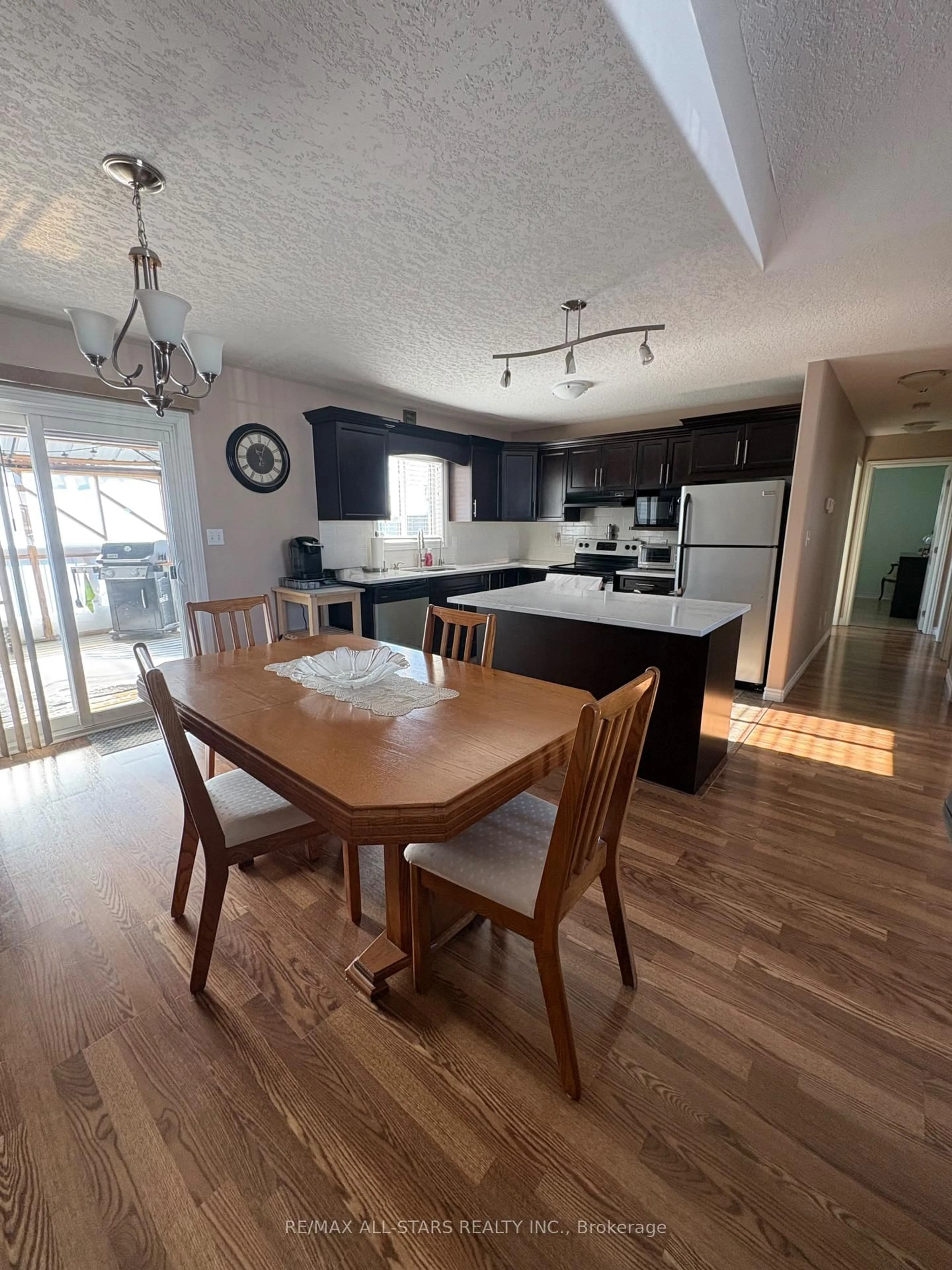 Open concept kitchen, wood/laminate floor for 23 Fox Den Dr, Brighton Ontario K0K 1H0
