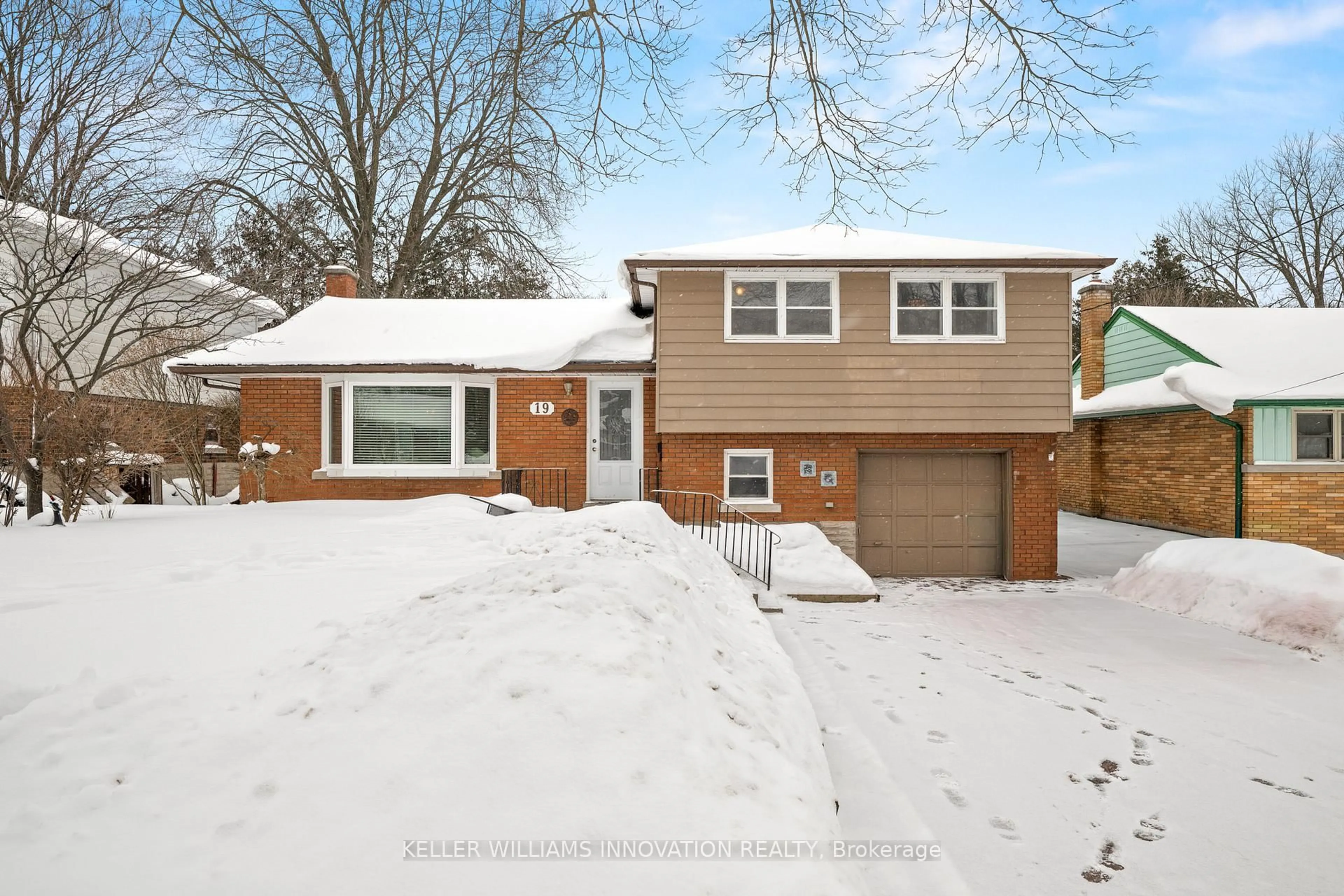 Home with brick exterior material, street for 19 Perkell Pl, Kitchener Ontario N2B 1J3