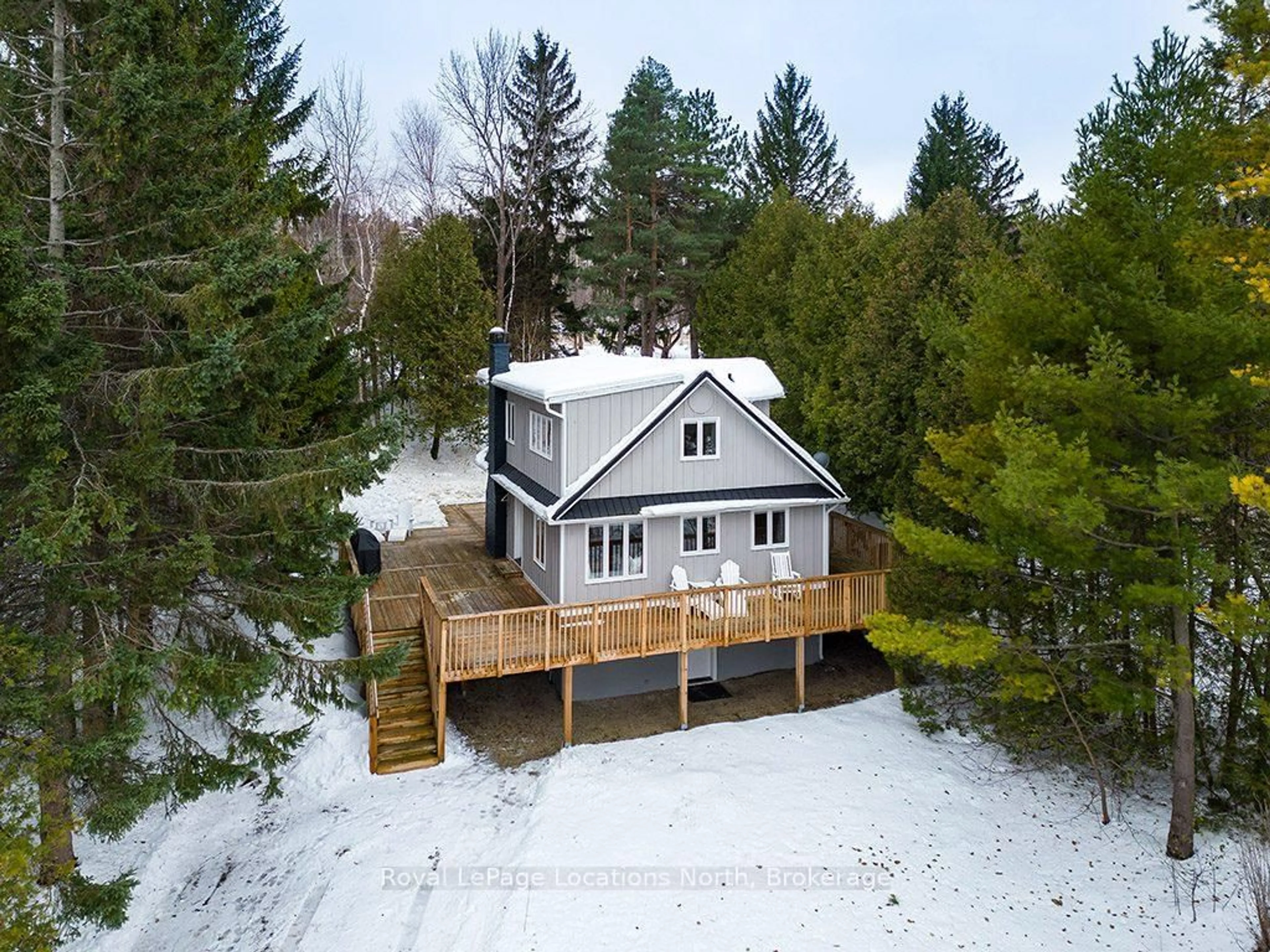 A pic from outside/outdoor area/front of a property/back of a property/a pic from drone, water/lake/river/ocean view for 128 TESKEY Dr, Blue Mountains Ontario N0H 1J0