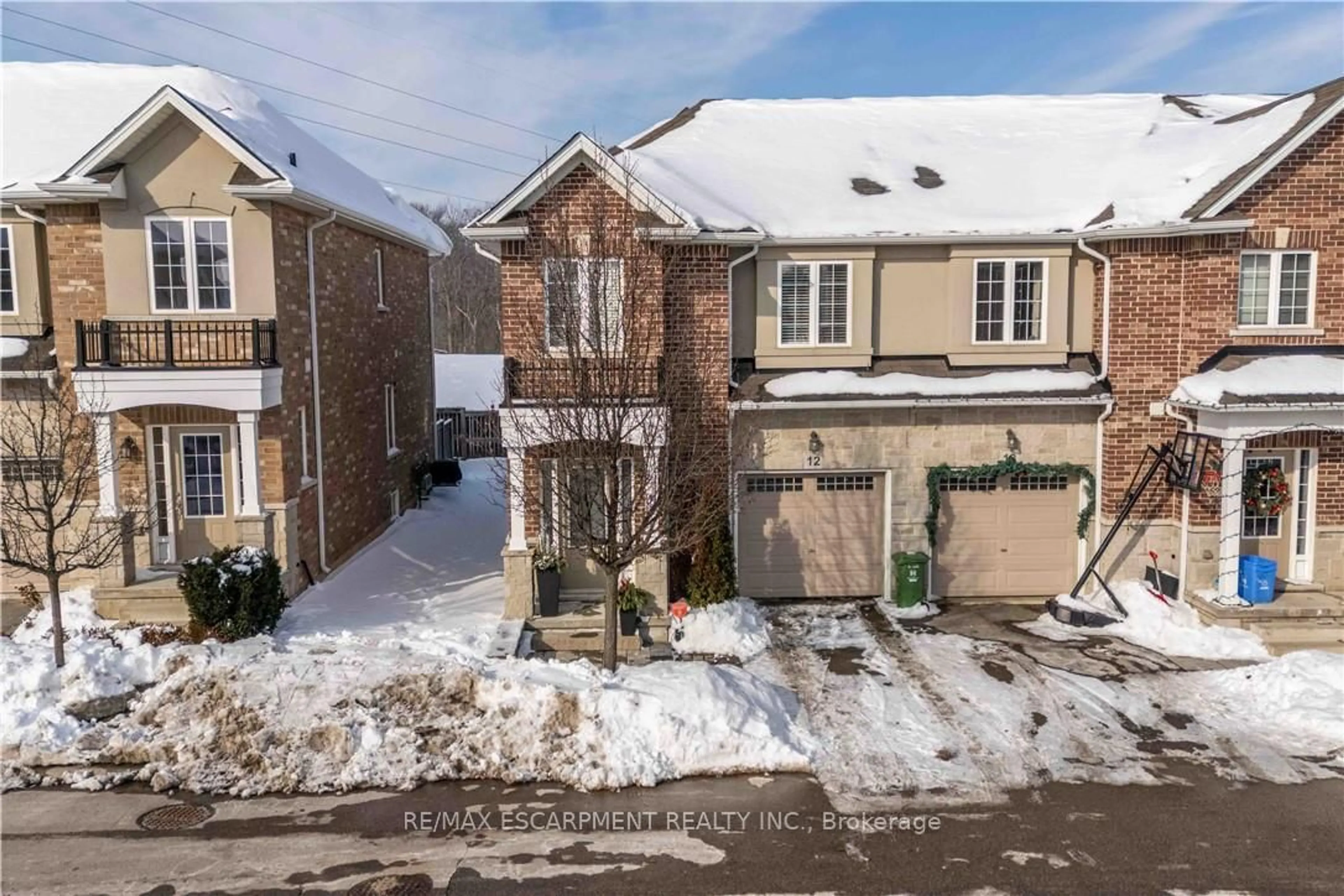 A pic from outside/outdoor area/front of a property/back of a property/a pic from drone, street for 90 RAYMOND Rd #12, Hamilton Ontario L9K 0J6