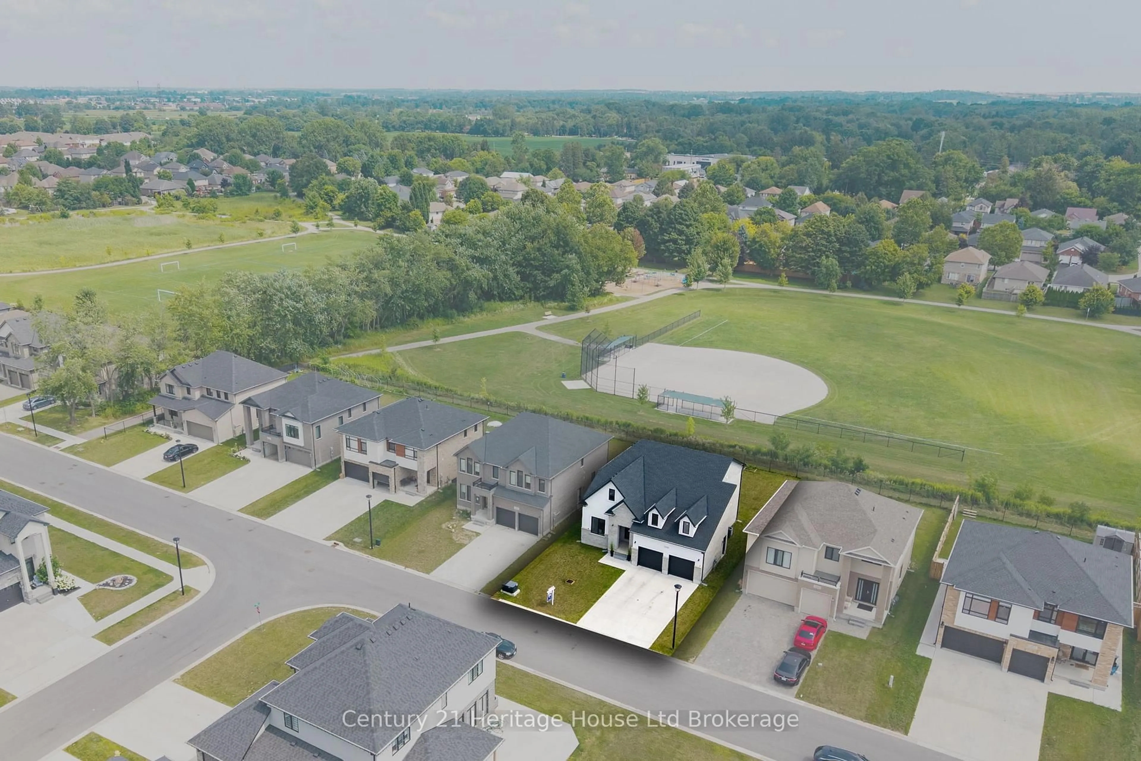 A pic from outside/outdoor area/front of a property/back of a property/a pic from drone, street for 2363 Bakervilla St, London South Ontario N6P 0H4