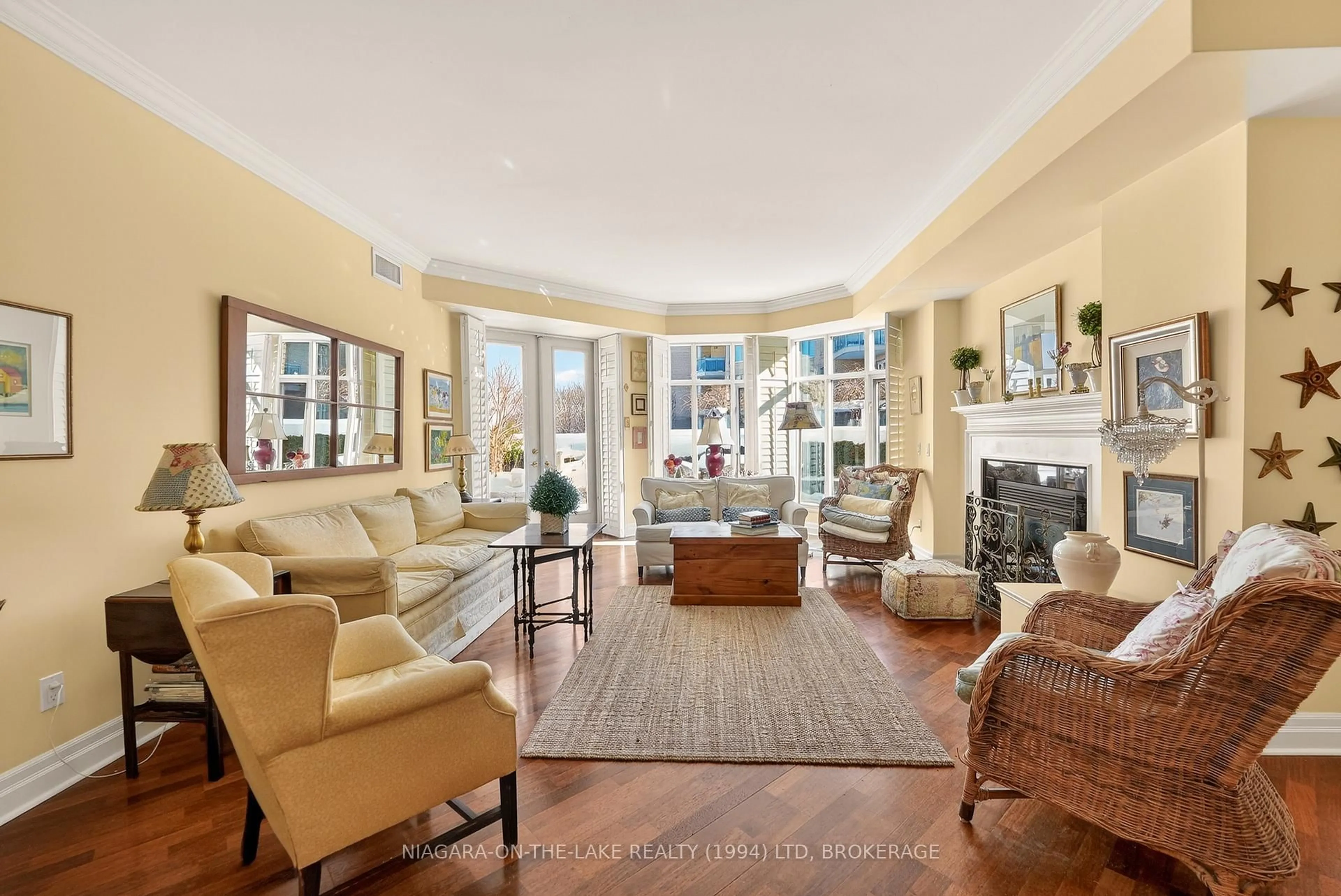 Living room with furniture, ceramic/tile floor for 215 Ricardo St #107, Niagara-on-the-Lake Ontario L0S 1J0