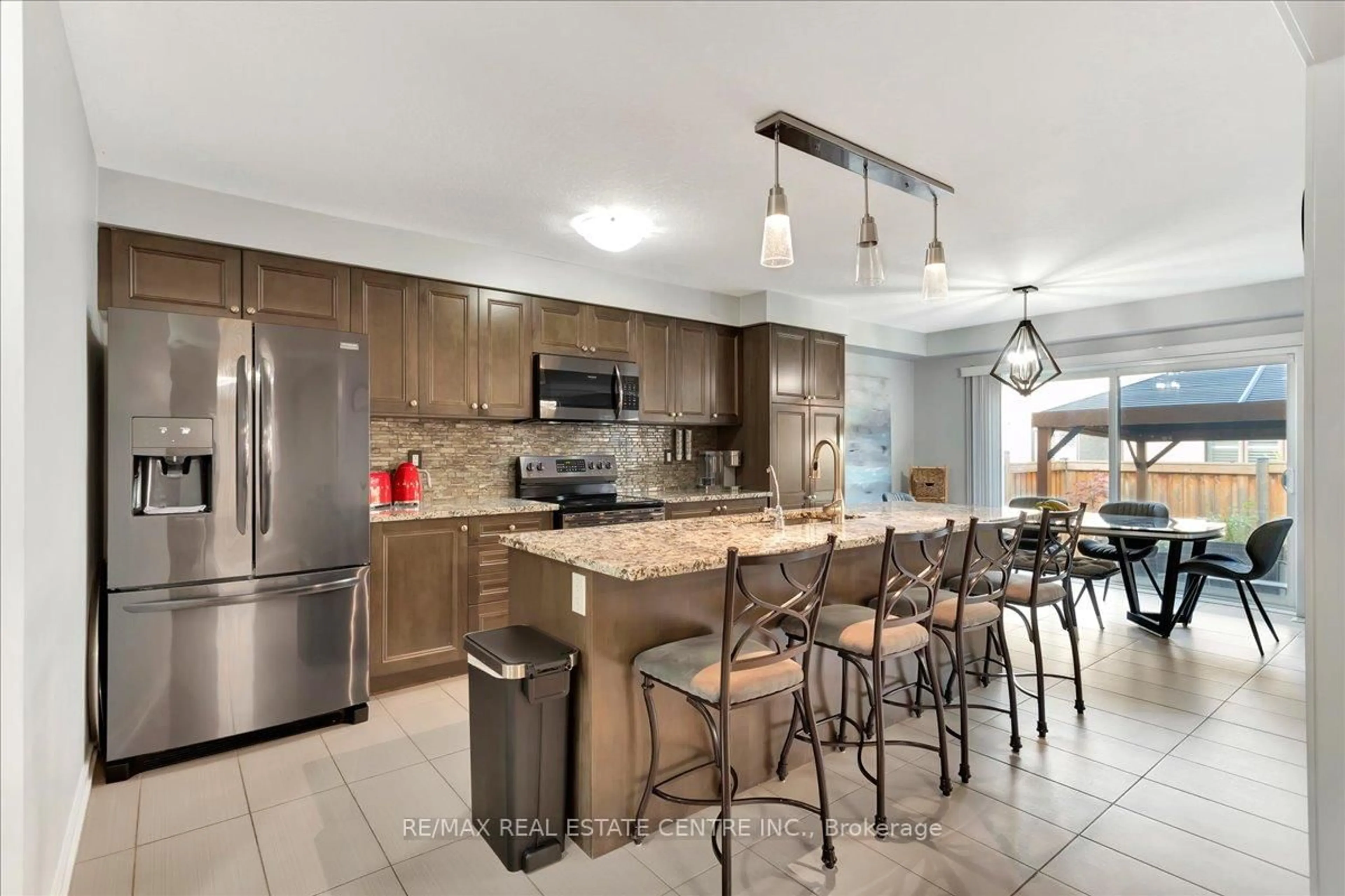 Open concept kitchen, ceramic/tile floor for 30 Scarletwood St, Hamilton Ontario L8J 0K8