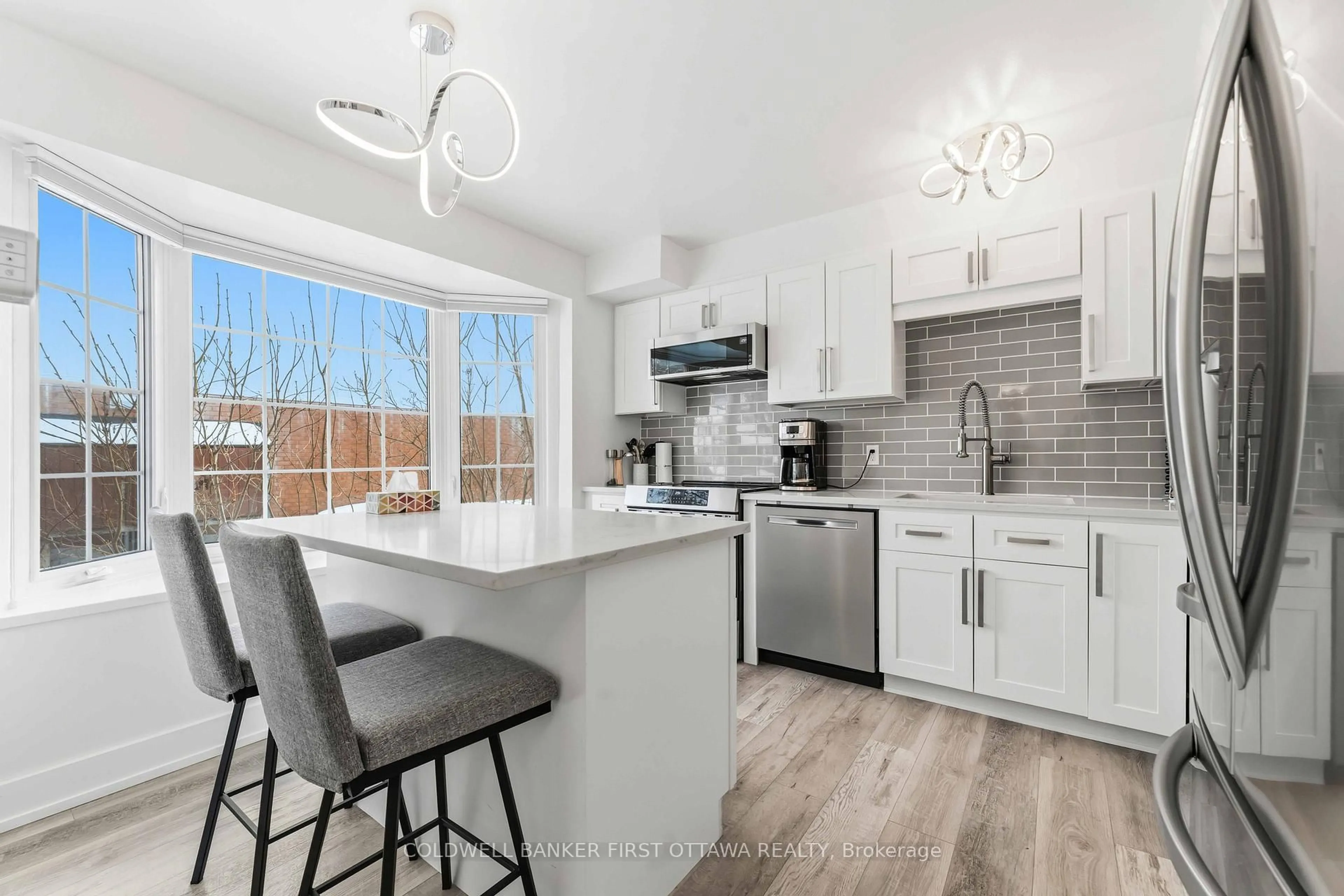 Open concept kitchen, ceramic/tile floor for 33 Monterey Dr, Ottawa Ontario K2H 7A9