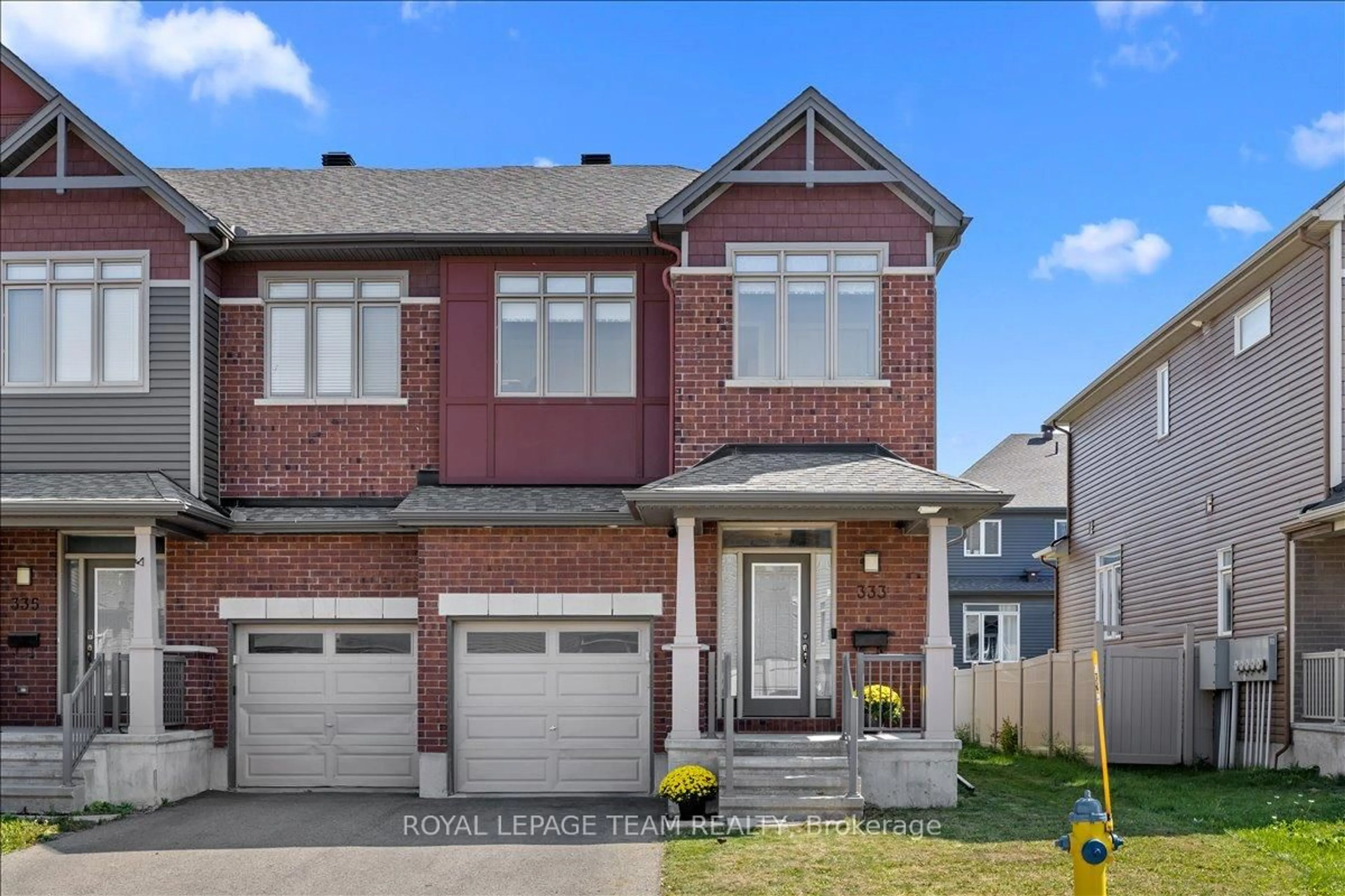 Home with brick exterior material, street for 333 Tulum Cres, Ottawa Ontario K2S 0V9