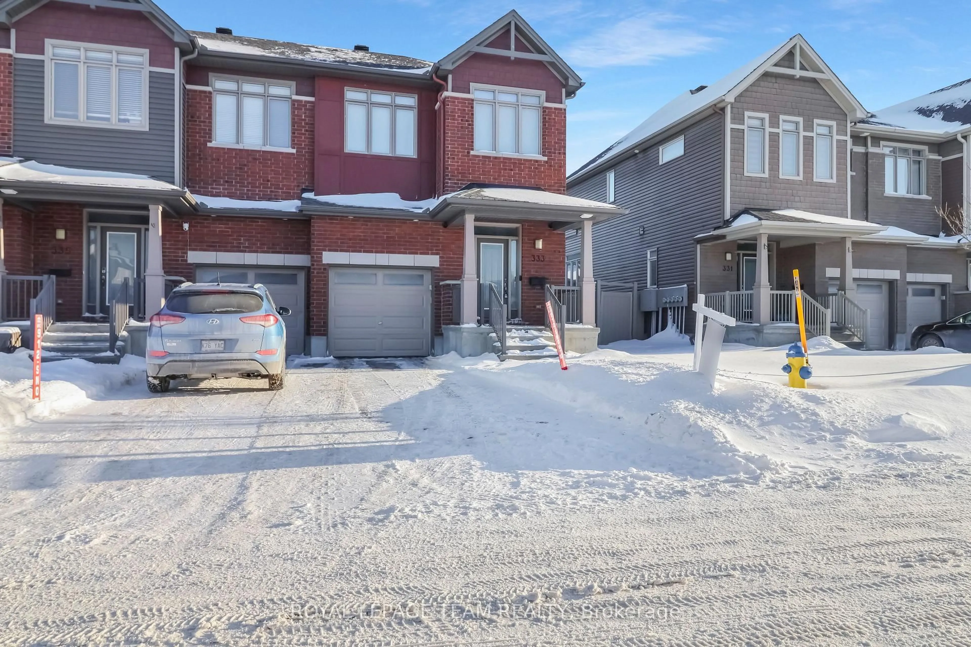 Home with brick exterior material, street for 333 Tulum Cres, Ottawa Ontario K2S 0V9