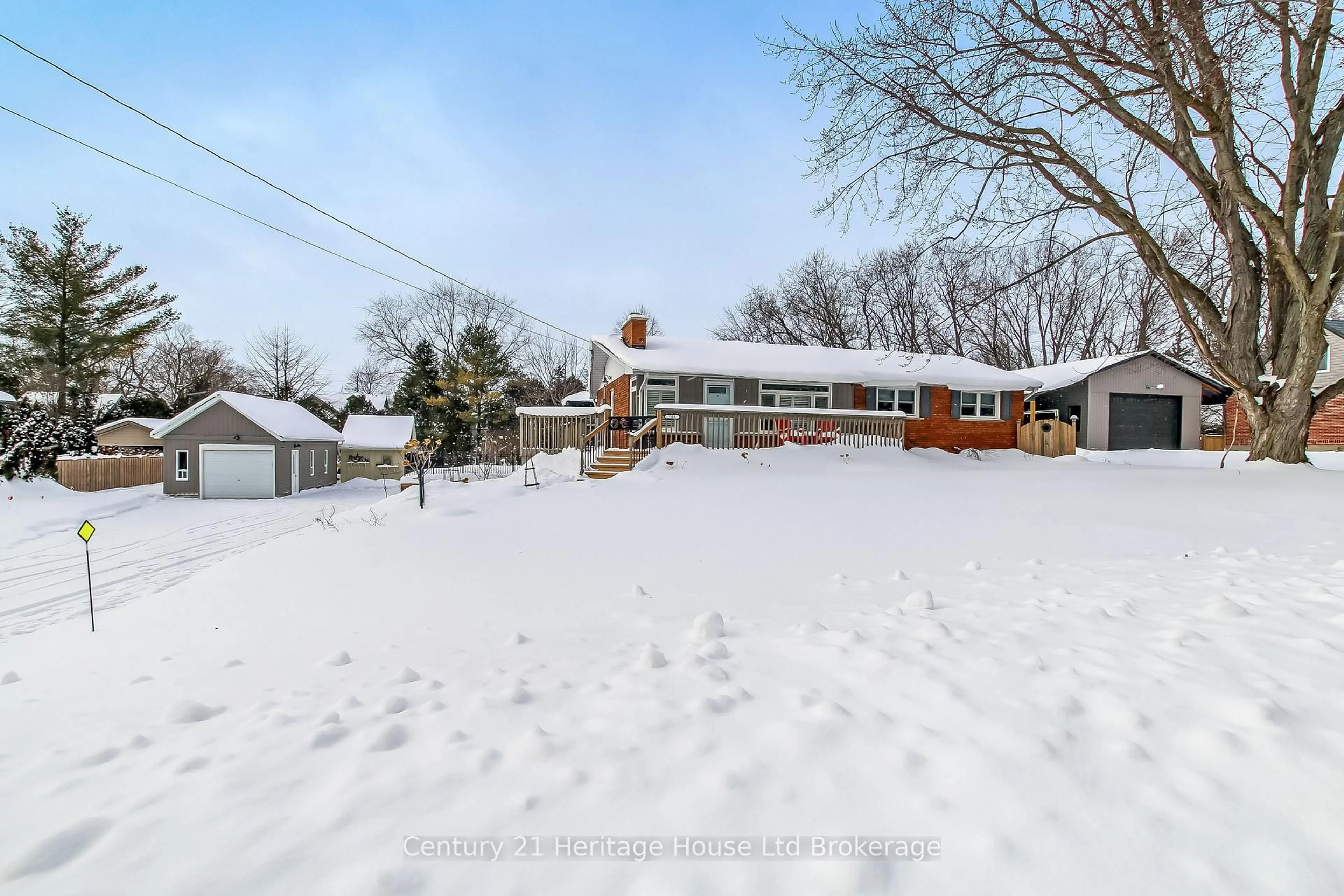 A pic from outside/outdoor area/front of a property/back of a property/a pic from drone, street for 702 Queen St, East Zorra-Tavistock Ontario N0J 1M0