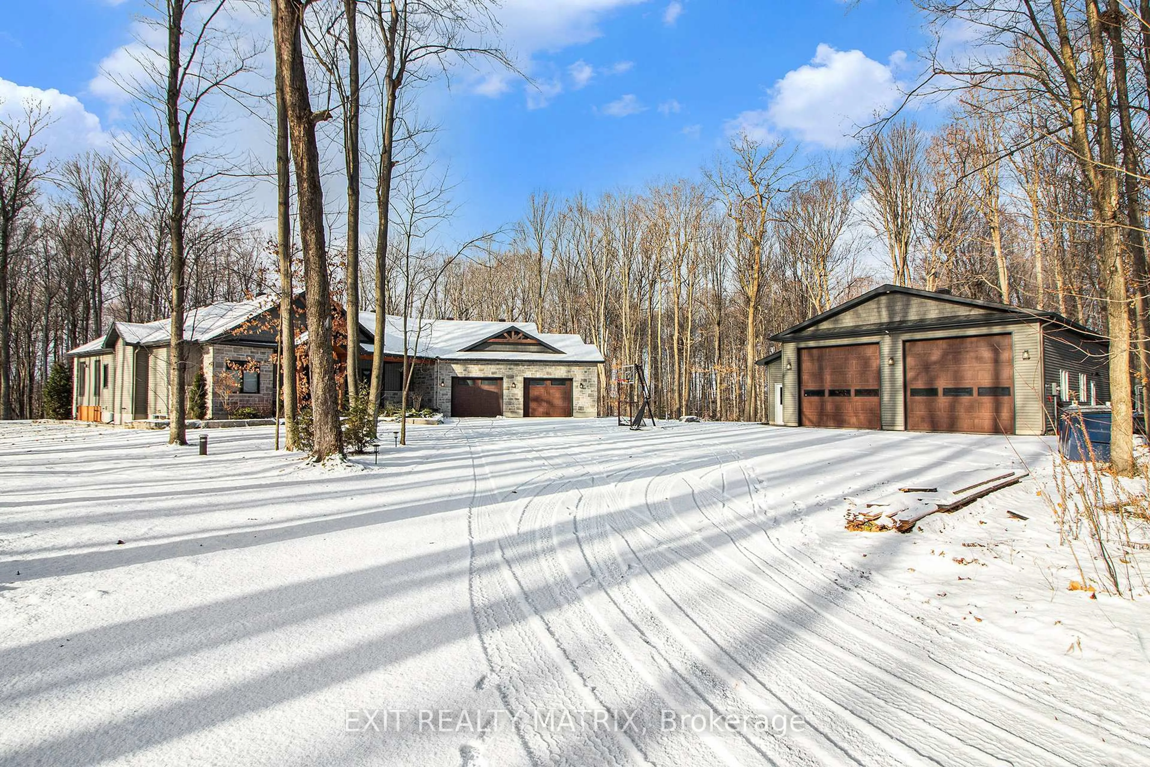 A pic from outside/outdoor area/front of a property/back of a property/a pic from drone, forest/trees view for 1772 Groves Rd, Russell Ontario K4R 1E5