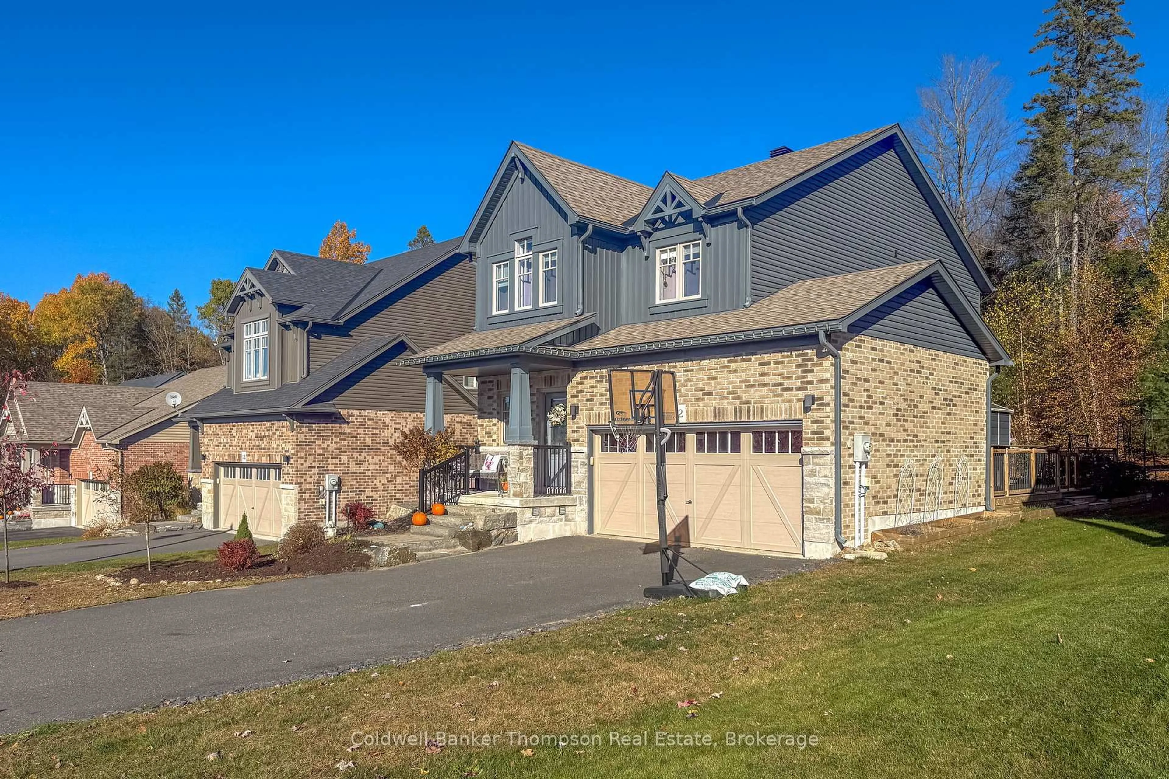 Home with brick exterior material, street for 12 Braeside Cres, Huntsville Ontario P1H 0C5