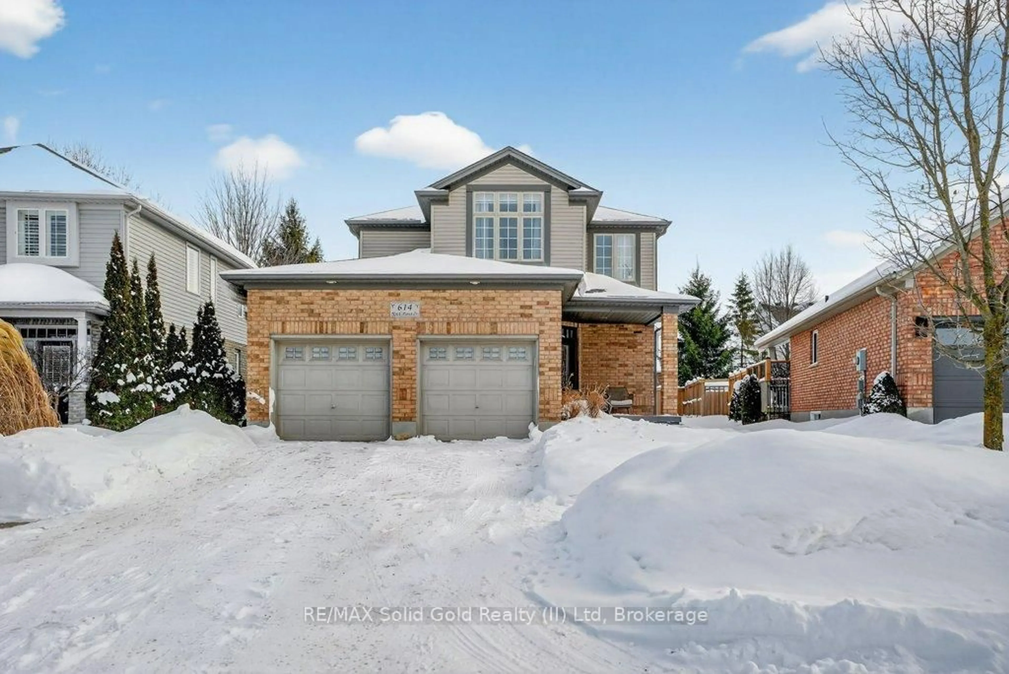 Home with brick exterior material, street for 614 Rock Point Cres, Waterloo Ontario N2V 2K3