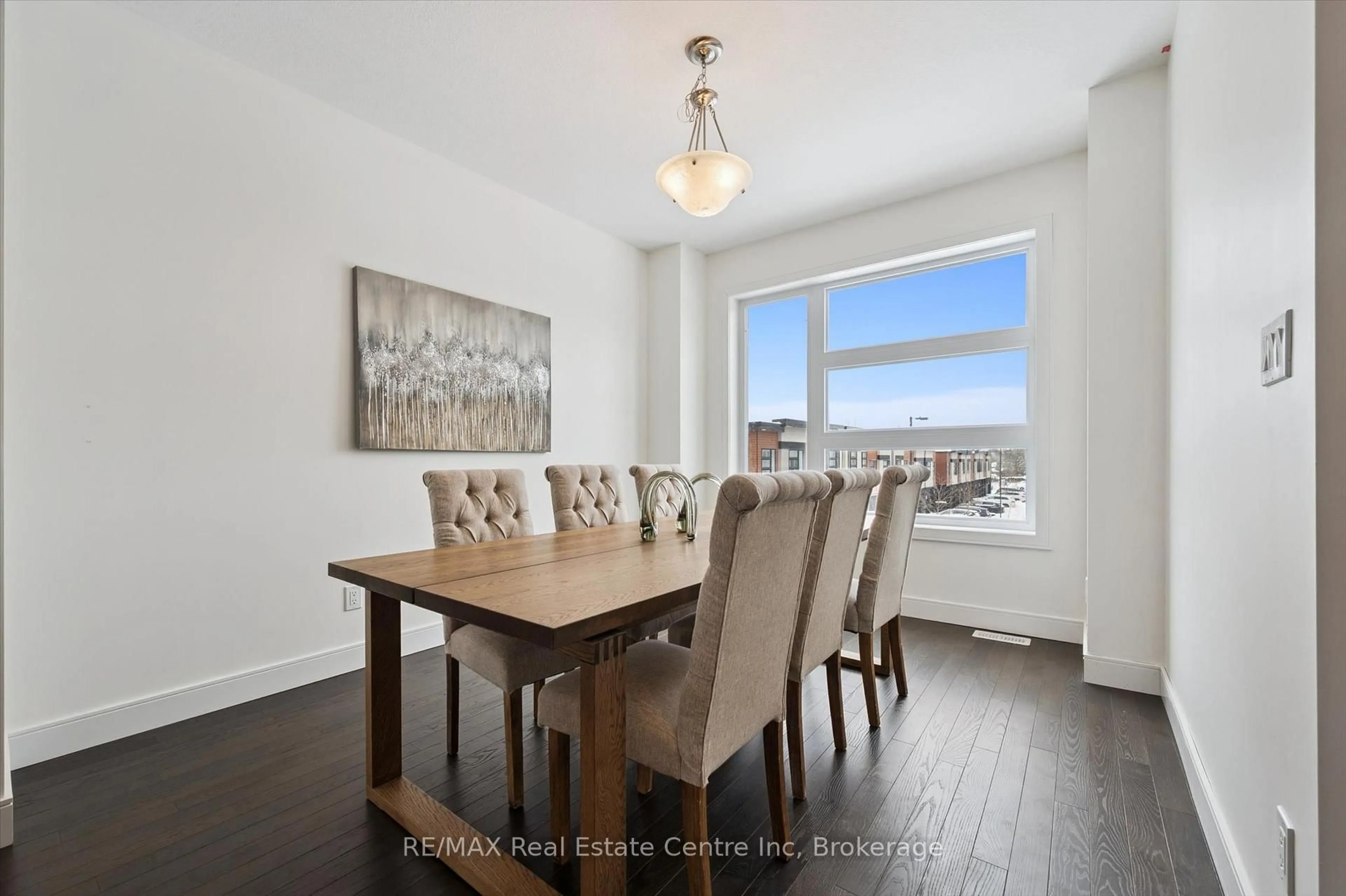 Dining room, wood/laminate floor for 60 Arkell Rd #71, Guelph Ontario N1L 0N8