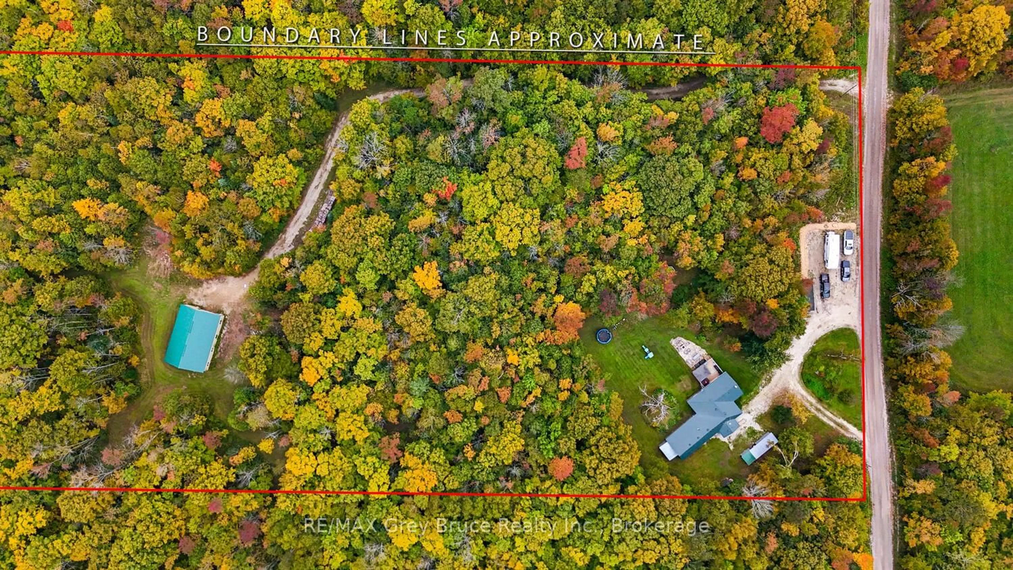 A pic from outside/outdoor area/front of a property/back of a property/a pic from drone, forest/trees view for 217 Kings Cres, South Bruce Peninsula Ontario N0H 2T0