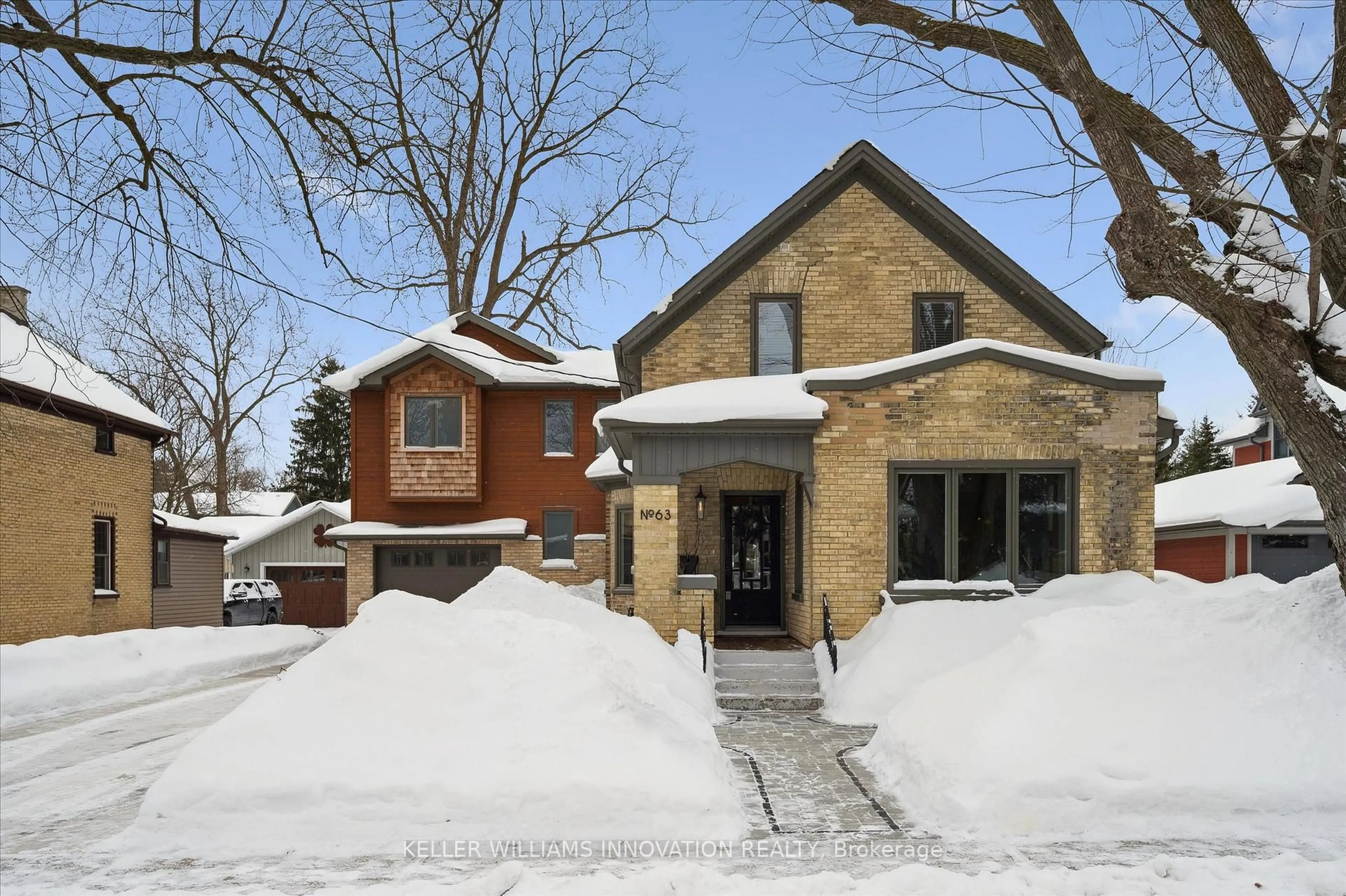 Home with brick exterior material, street for 63 Menno St, Waterloo Ontario N2L 2A6